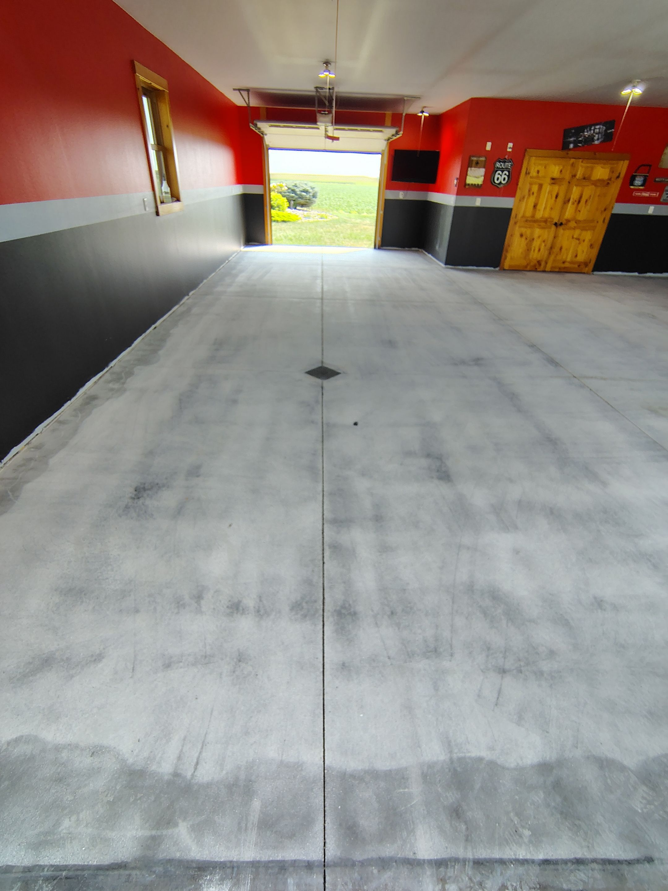 Multi-Car Garage Concrete Coating and Floor Refinishing in Hull by Select Painting, Coatings & Garage Cabinets