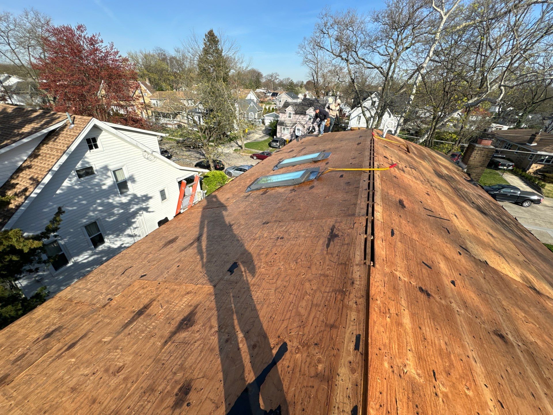 Moire Black Shingles by Reimagine Roofing