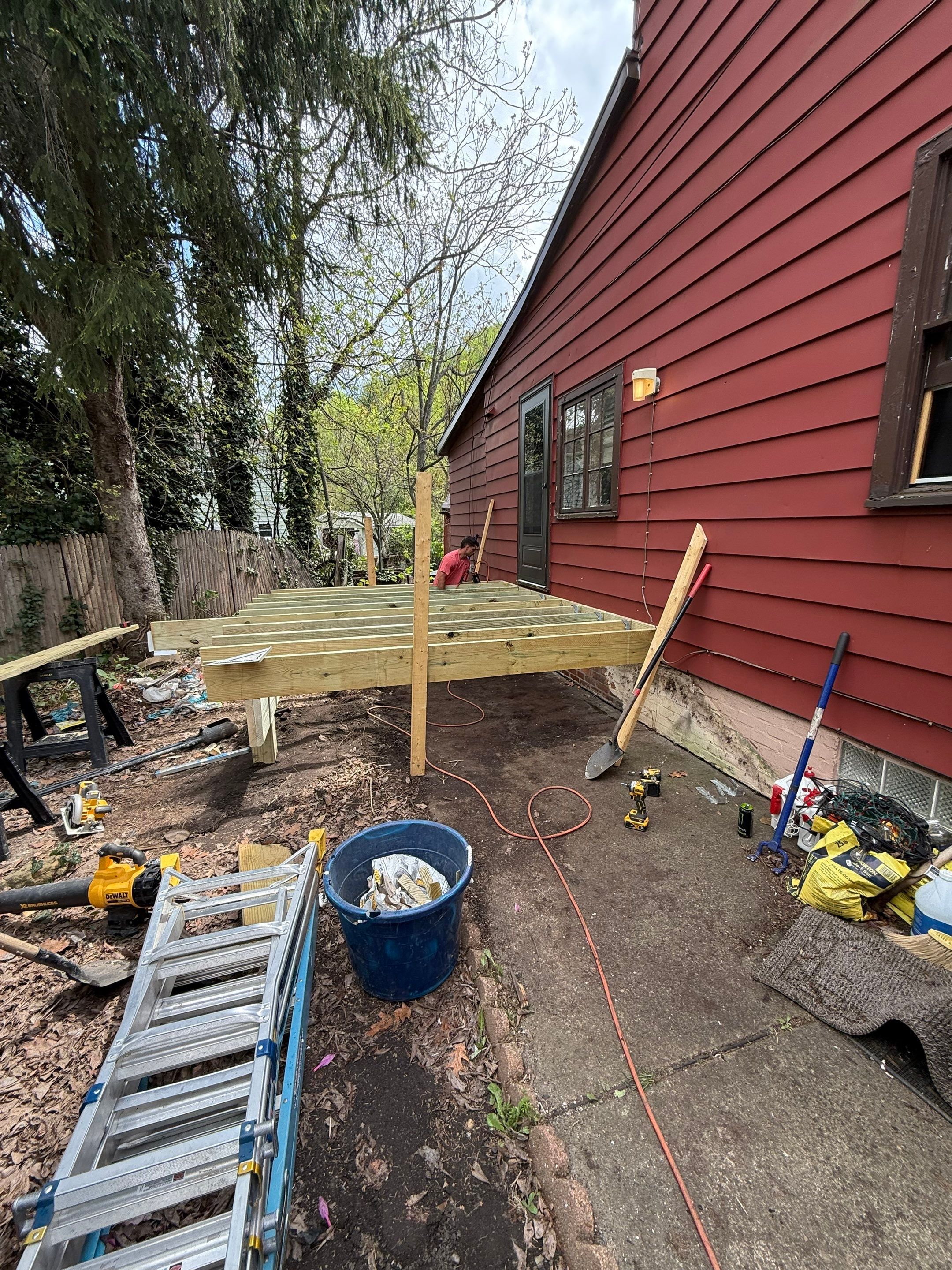 Roof sunspace deck  by Cousins Roofing Siding & Decks
