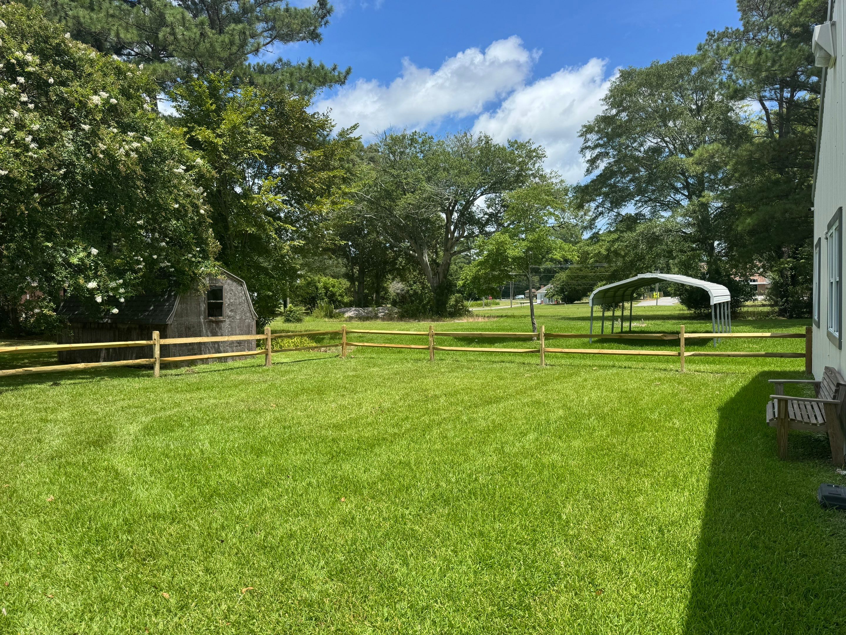 The Fence That Welcomes You Home by Tidewater Trim & Deck