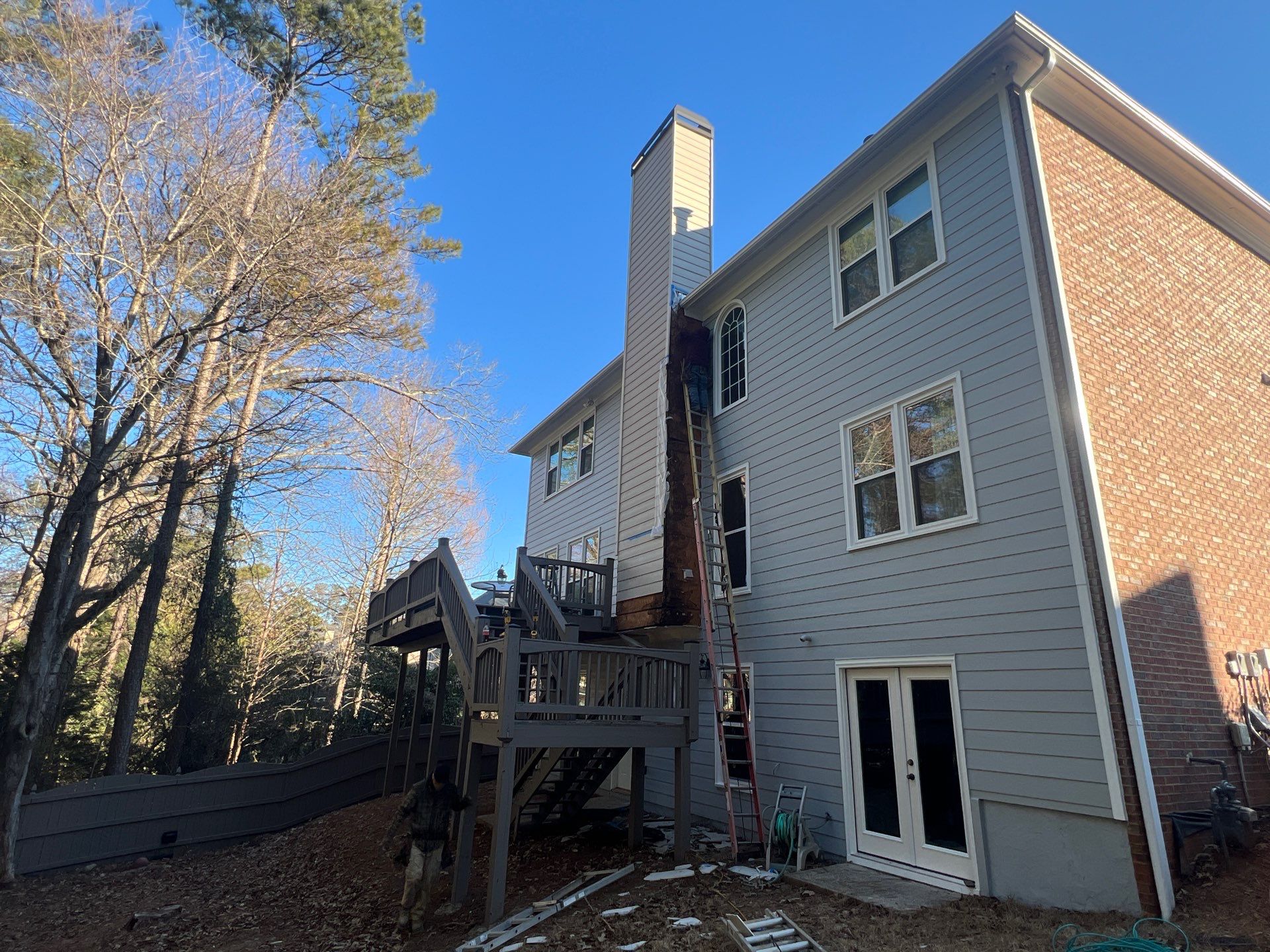 Chimney Siding Reconstruction and Full Exterior Painting in Marietta by Swift Home Renovations