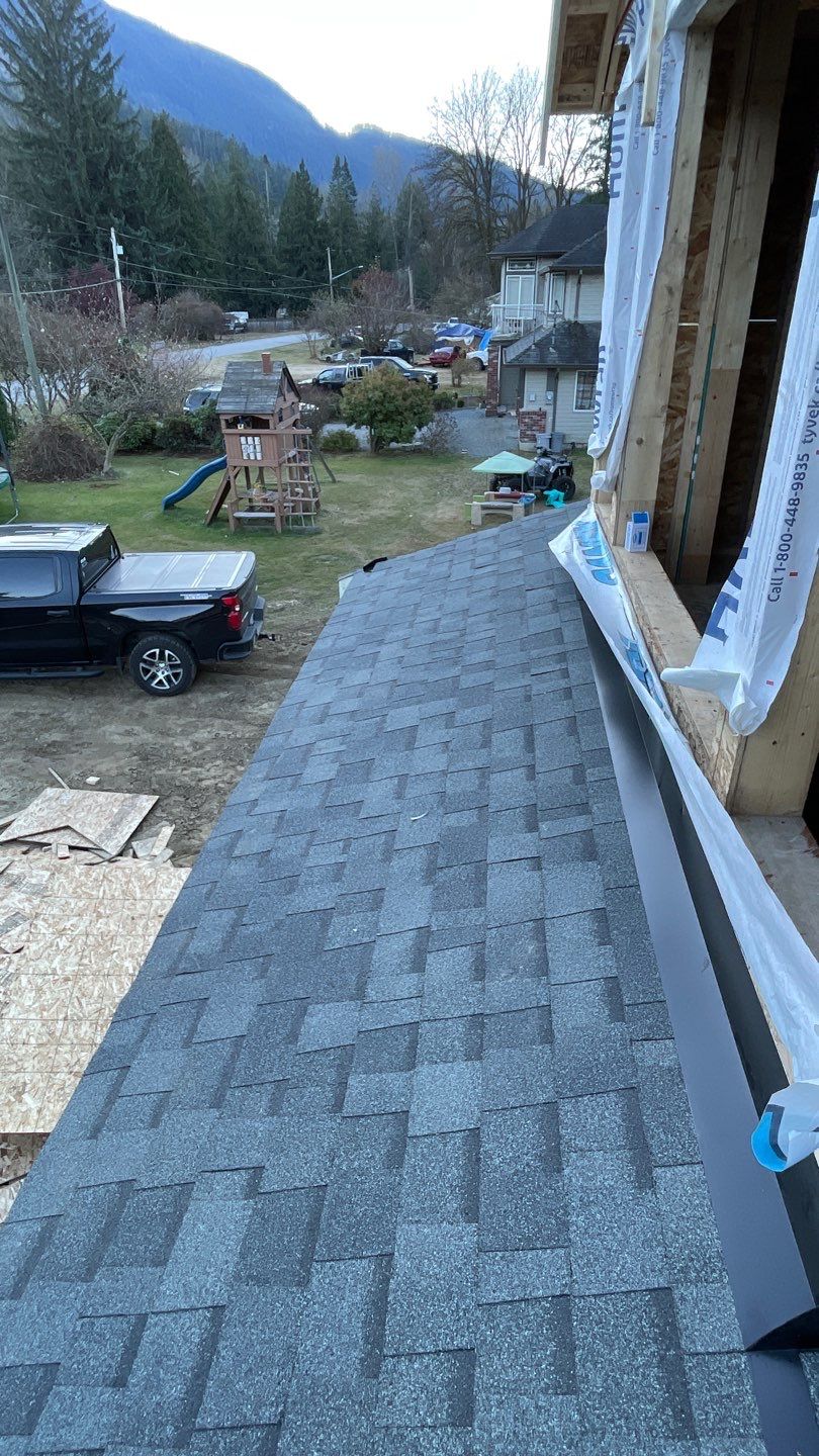 Residential Roofing Installation using OC Oakridge shingles by Top Notch Roofing Inc