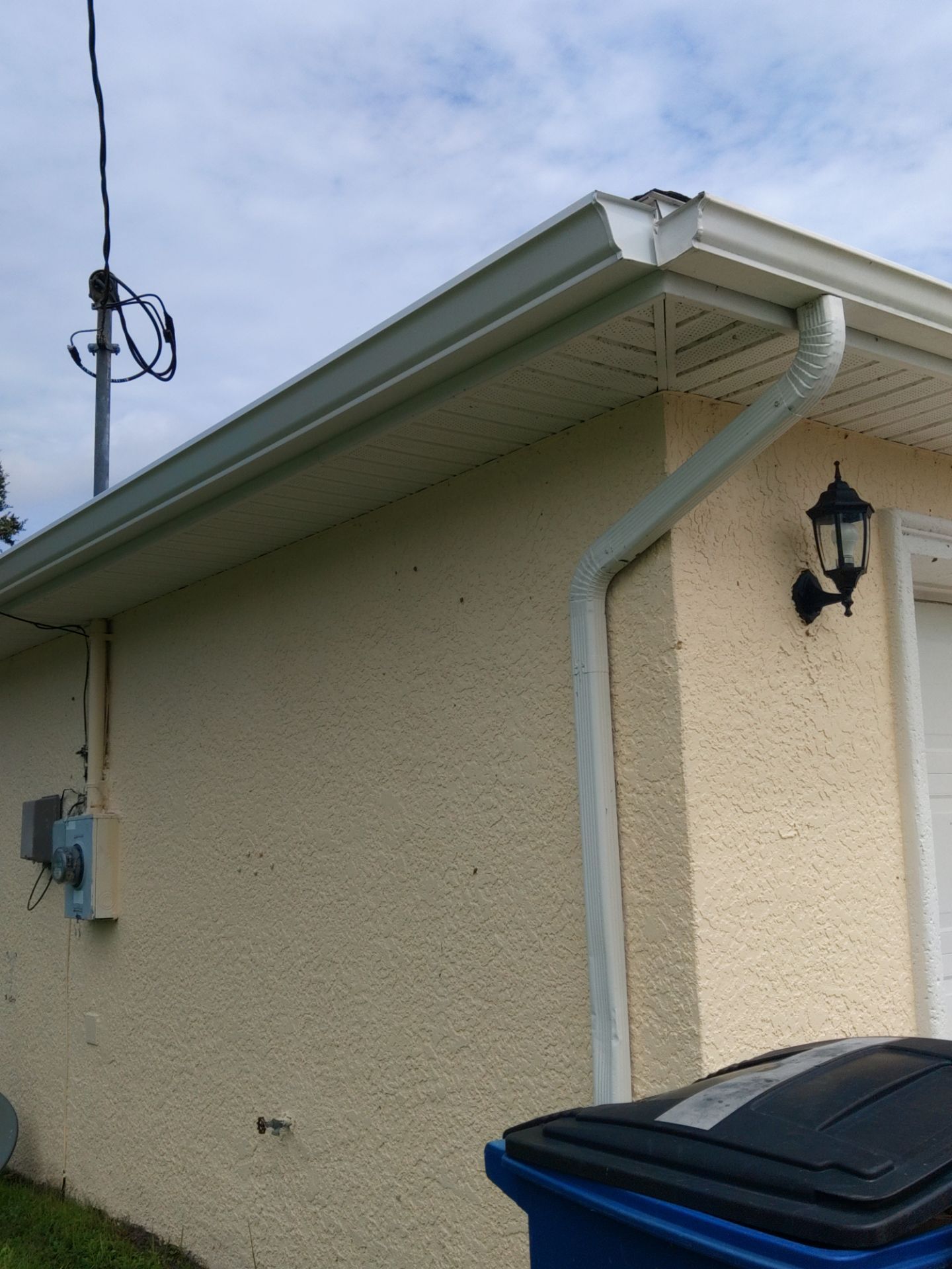 Seamless gutters in Lehigh Acres, FL provide a strong and efficient solution for managing heavy Florida rainfall by Gutter Professors