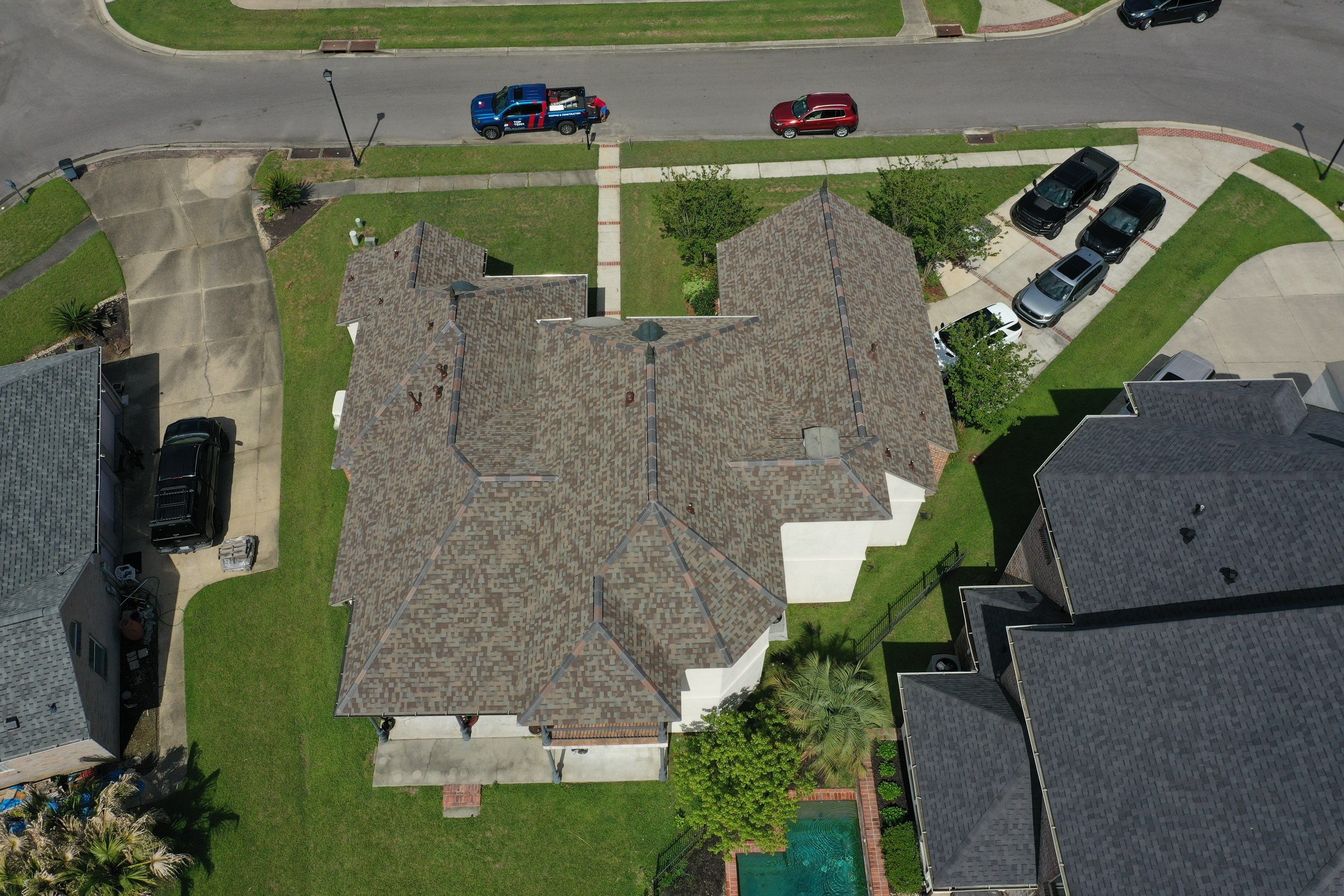 Owens Corning Duration Driftwood with Hecker Ridge Tile by Top Team Construction