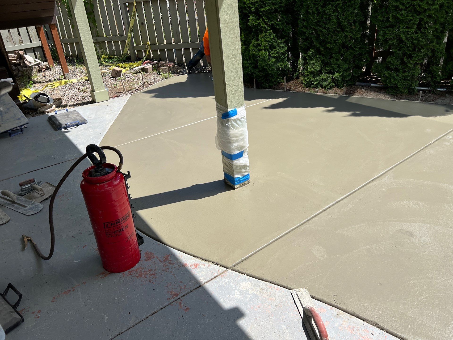 Ashley | Concrete Back Patio by Jireh Asphalt & Concrete Inc 