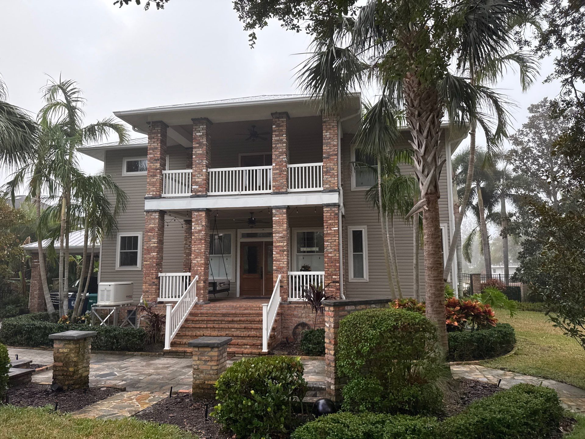 2-Story House Wash and Garage Pressure Washing in Palmetto, FL by Sunshine AquaWash