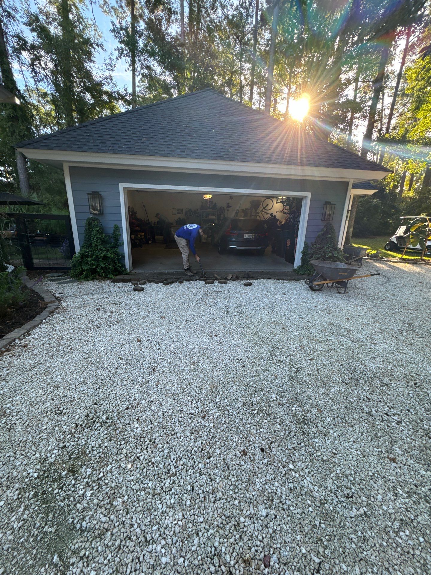 Concrete Driveway and Patio Installation With Decorative Brick Borders by Lowcountry Scapes, LLC