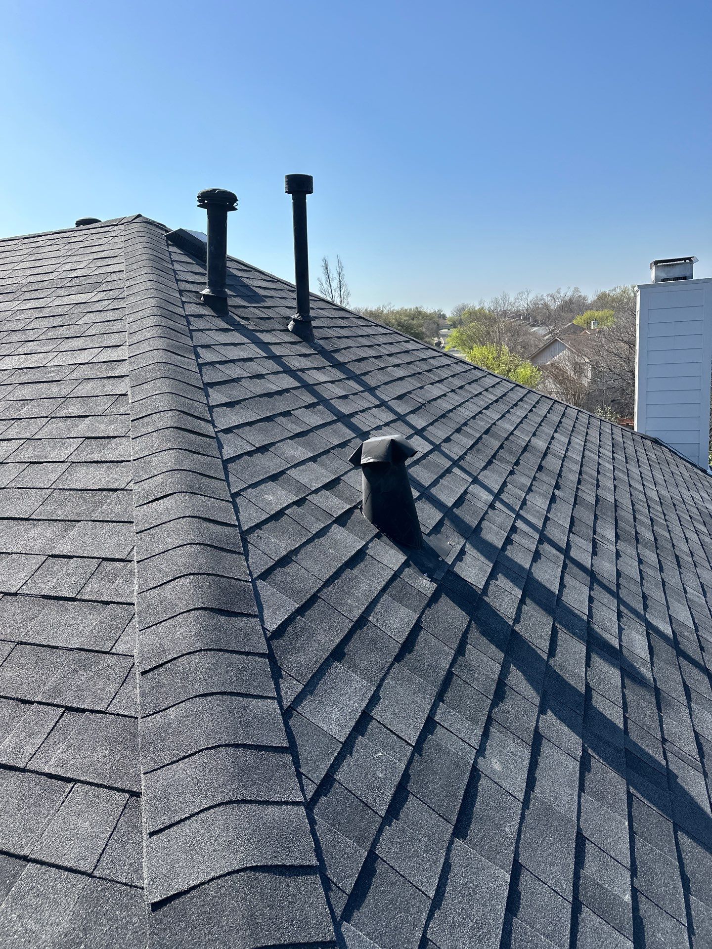 Residential Roofing Installation using Malarkey Vista Class 3 Matte Black by DeZign Roofing & Exteriors