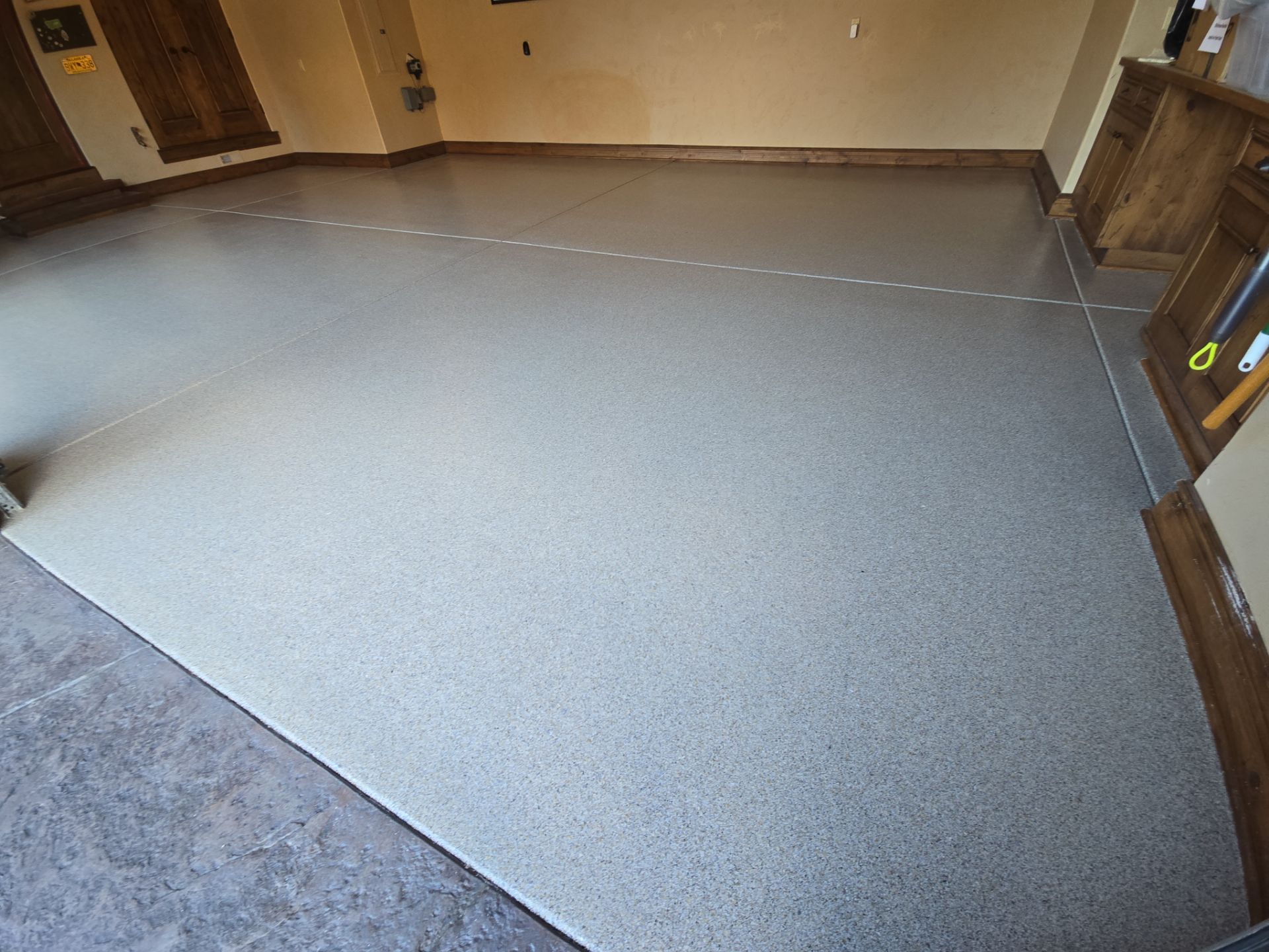 Garage Transformation using Stone/Marble Hybrid by Croc Coatings, LLC