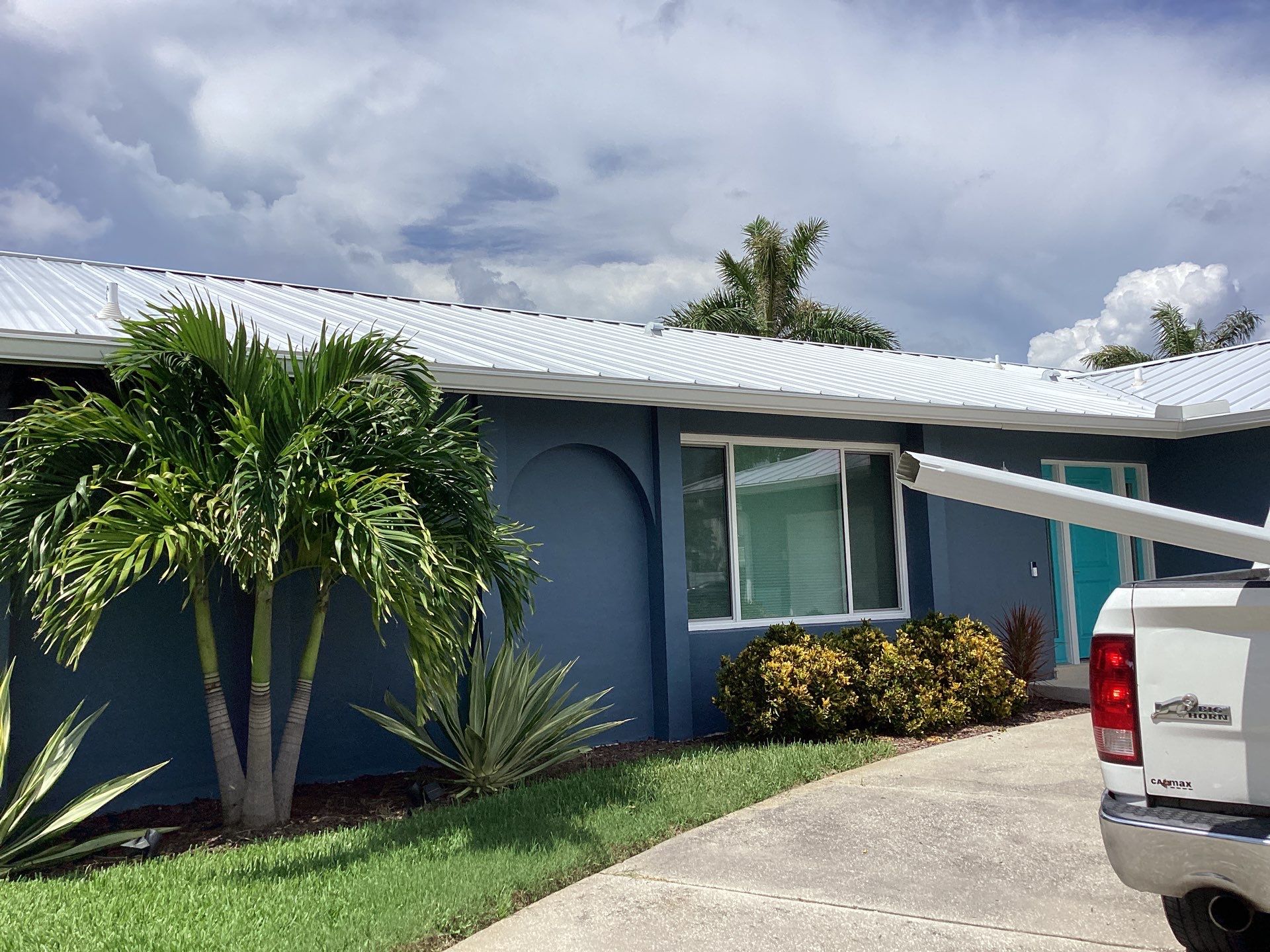 White Downspouts and Gutters Combo in Punta Gorda FL by Gutter Professors