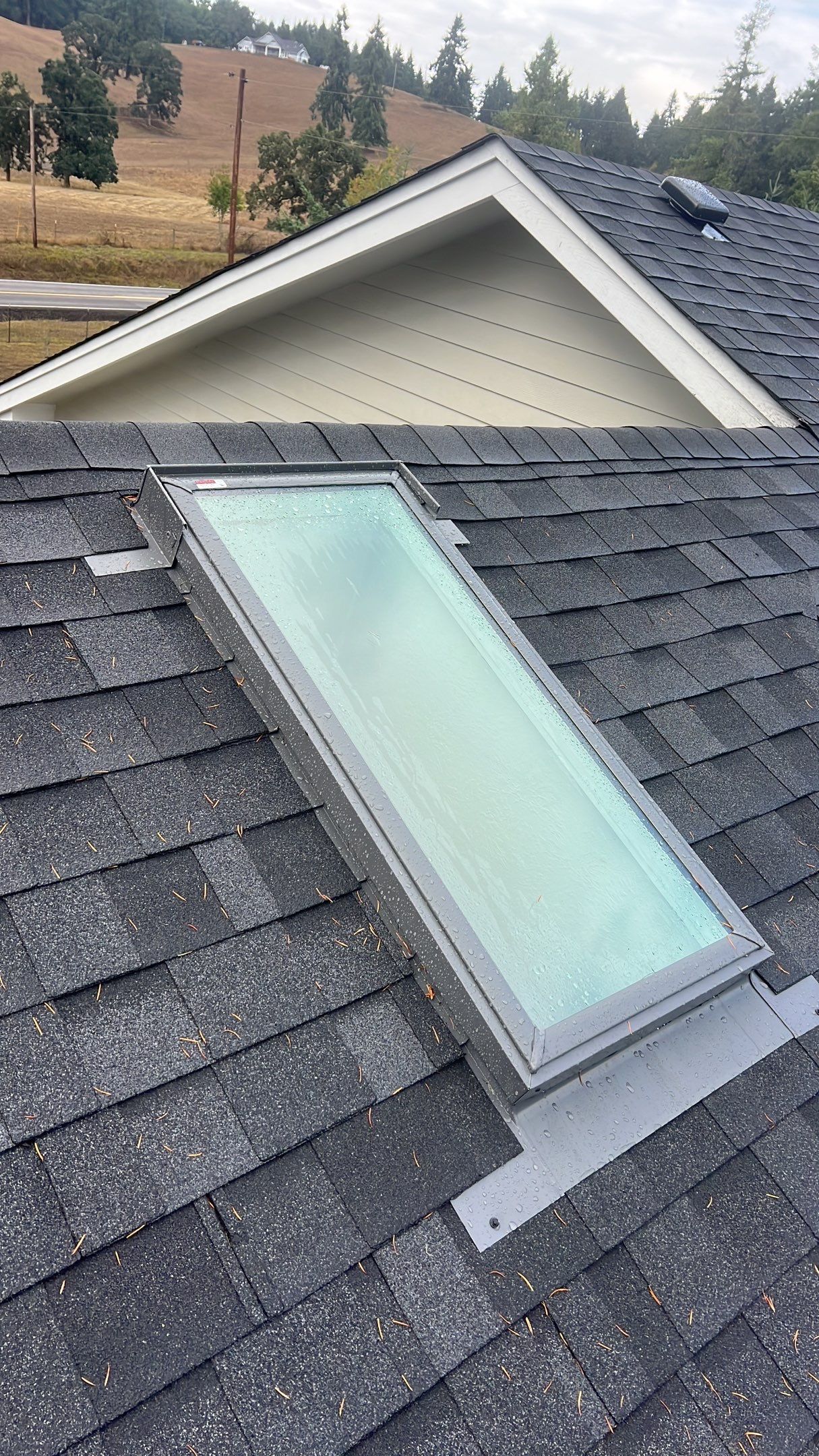 Residential Roofing Installation using IKO Dynasty (Color: Granite Black) by Orezona Building & Roofing Company, Inc.
