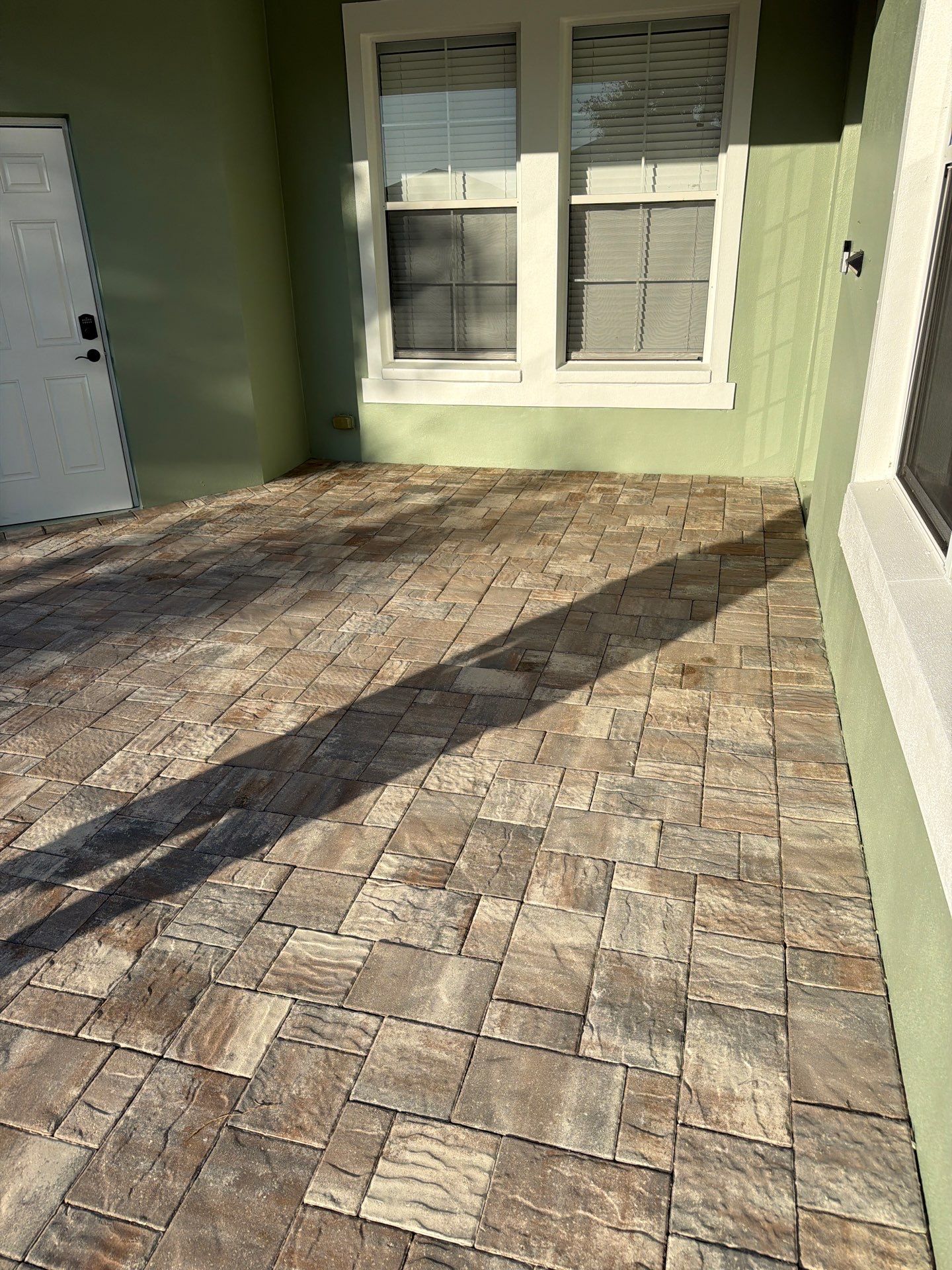 Multi-Toned Paver Patio and Walkway sealing in Mira Bay Apollo Beach by Supreme Paver Experts
