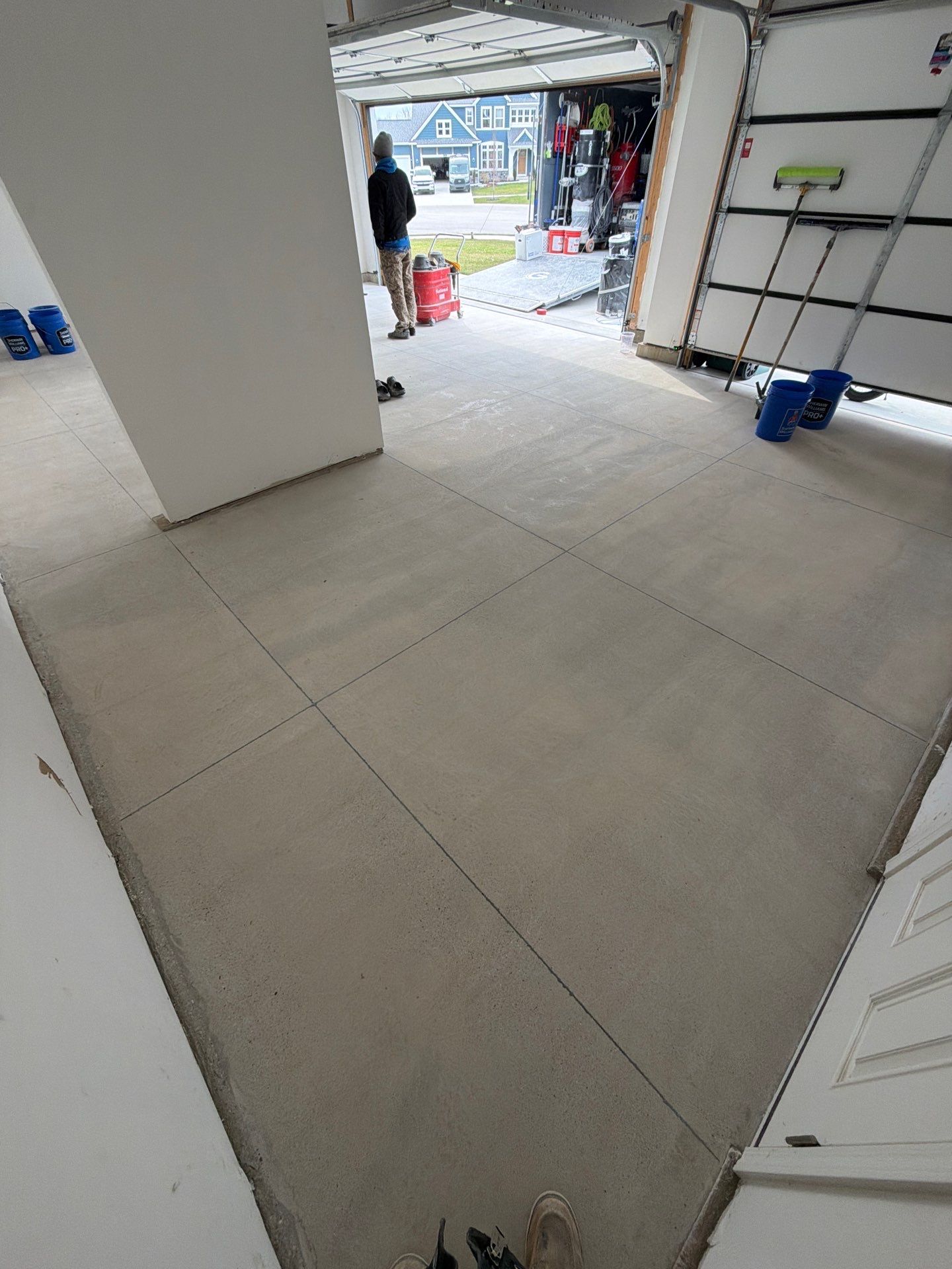 Multi-Car Garage Epoxy Flake Floor Installation in Byron Center by Gordon Painting