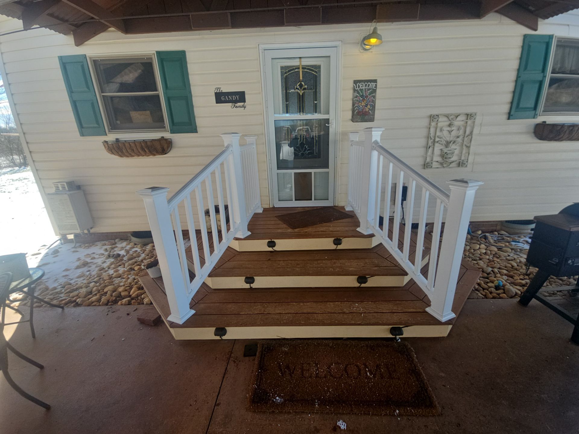 Carport Entry Vinyl Railing Install by A Step Above Handy LLC