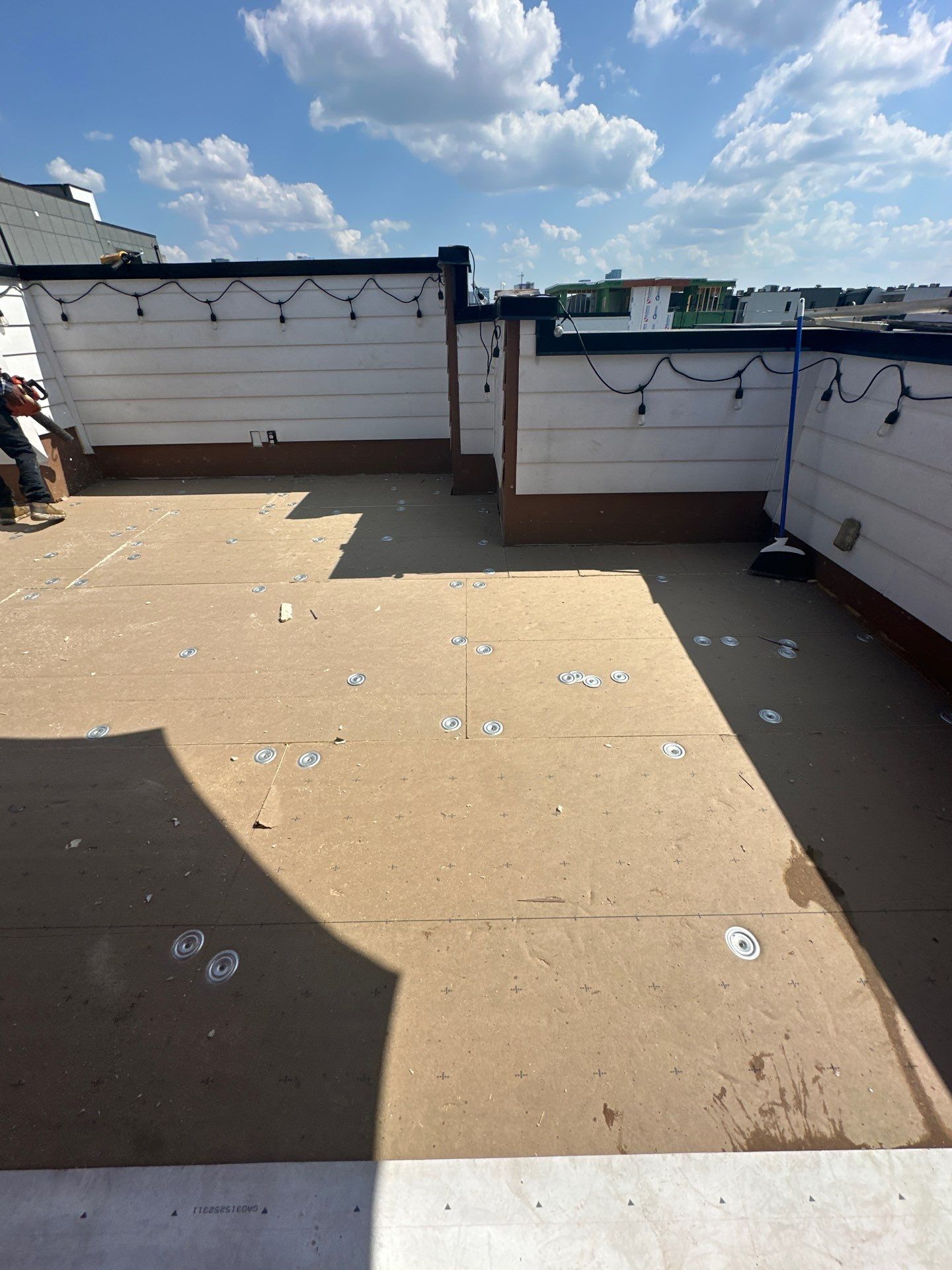 TPO Roofing System with Roof Deck Pavers by Undersun Roofing 