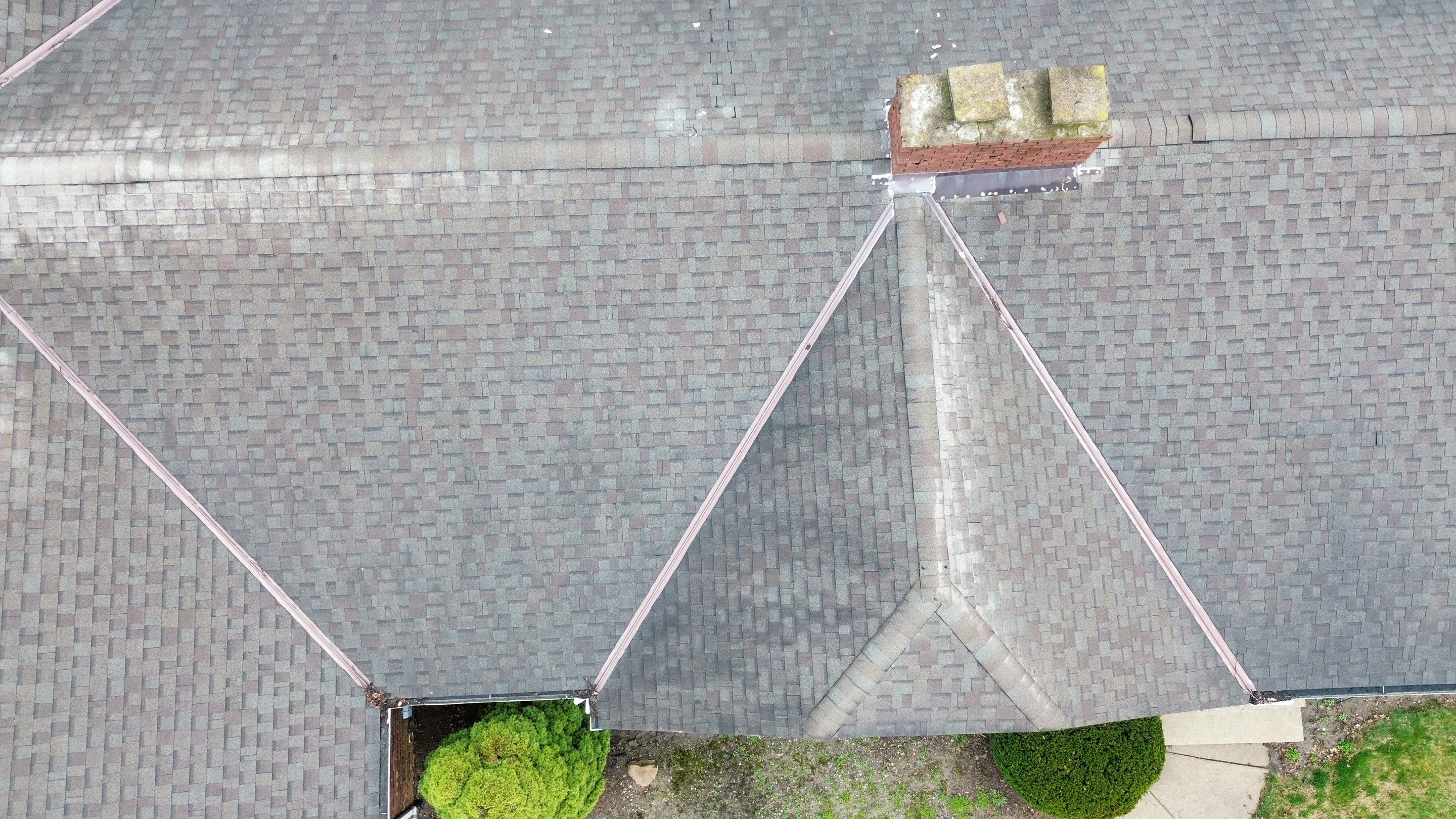 Residential Roofing Installation using Performance Panel Metal - Crinkle Bronze by RoofX 