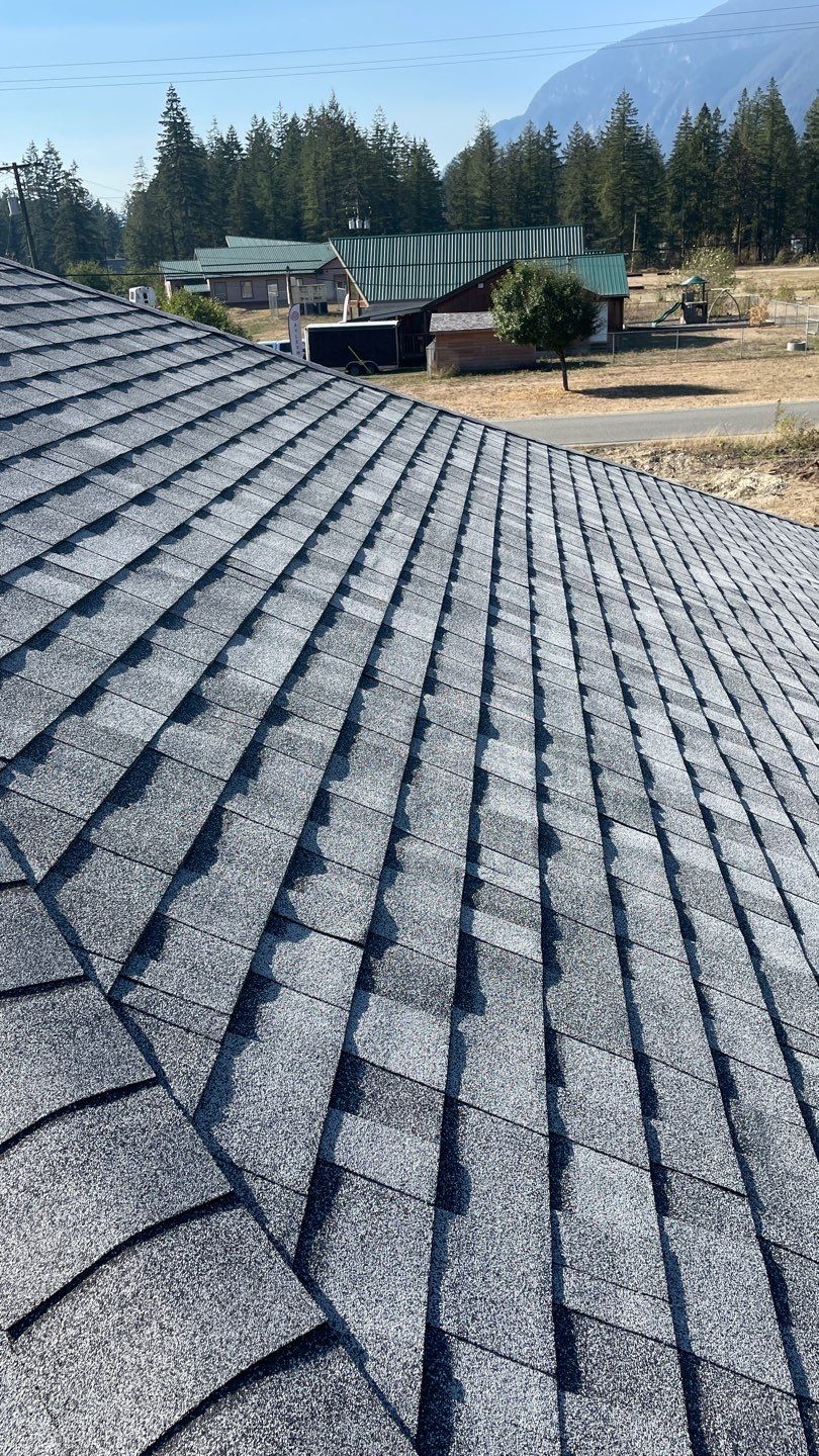 Residential Roofing Installation using OC Oakridge shingles by Top Notch Roofing Inc