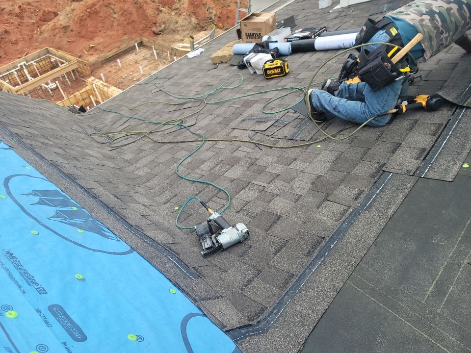 Residential Roofing Installation using Roof Replacement by American Roofing & Construction LLC
