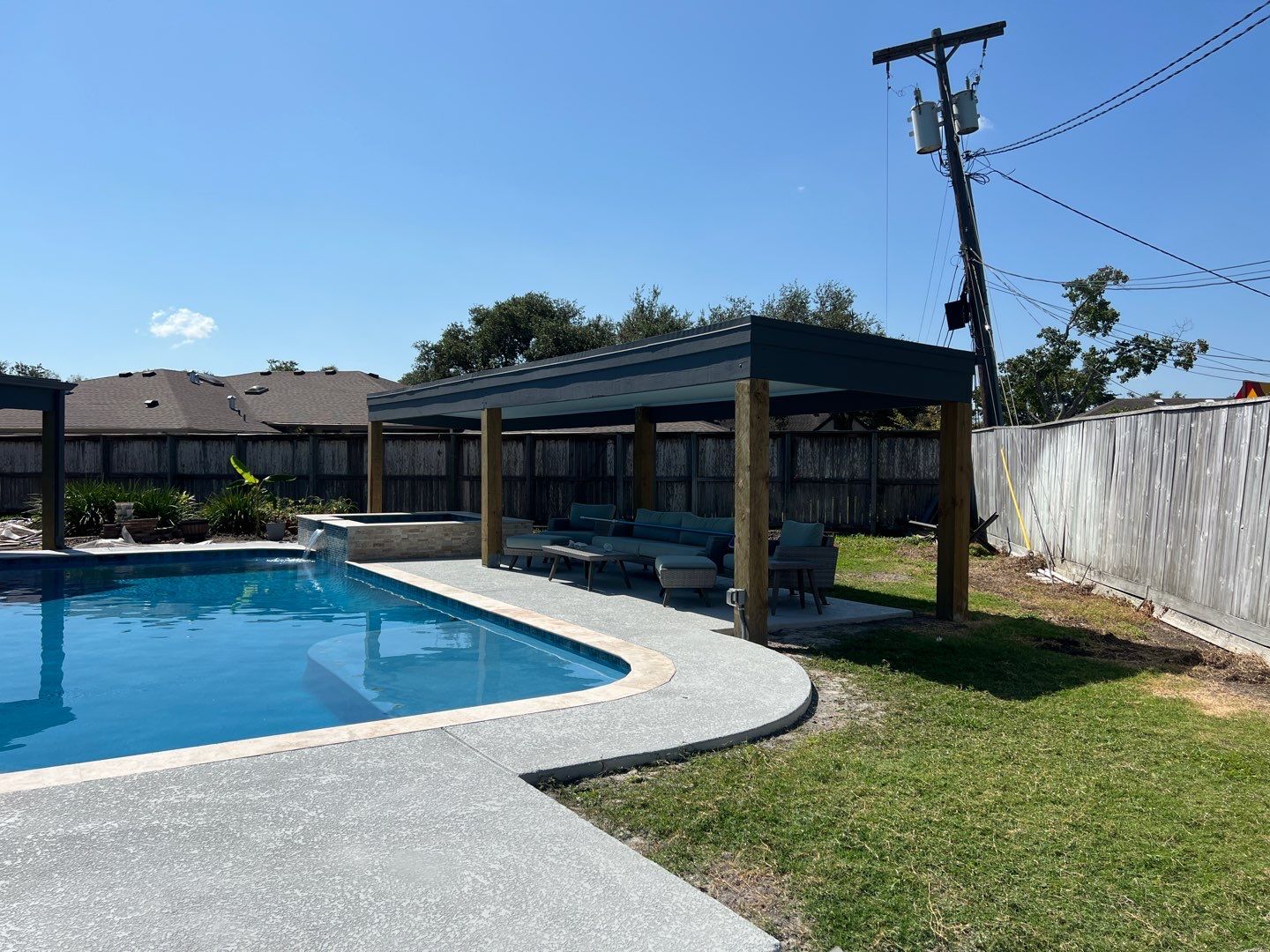 Beautiful pool side build by Bayfront Roofing and Construction