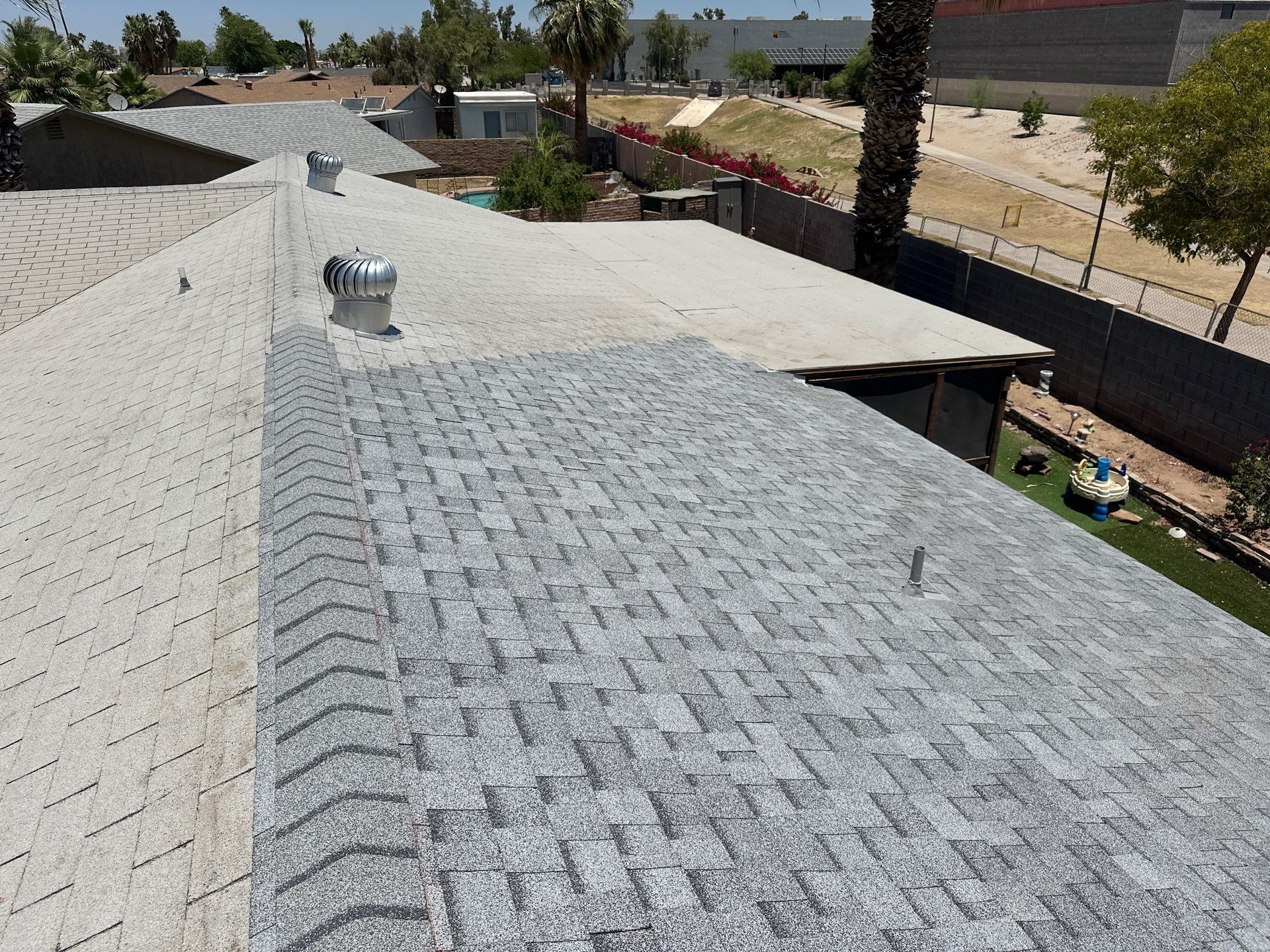 Estate Gray Shingles by Reimagine Roofing