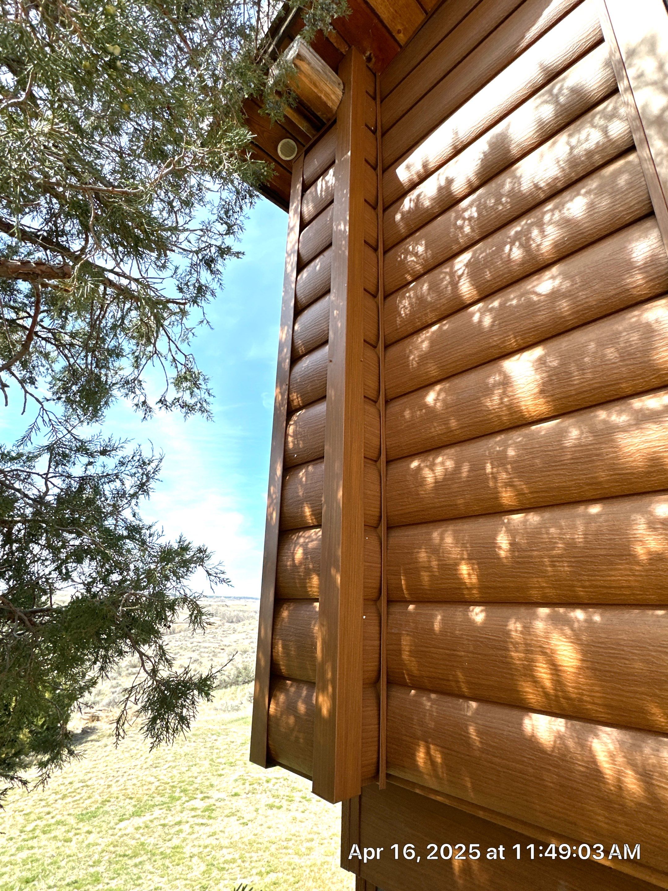 Siding Installation using Log Siding by Lynnrich Seamless Siding, Windows & Doors