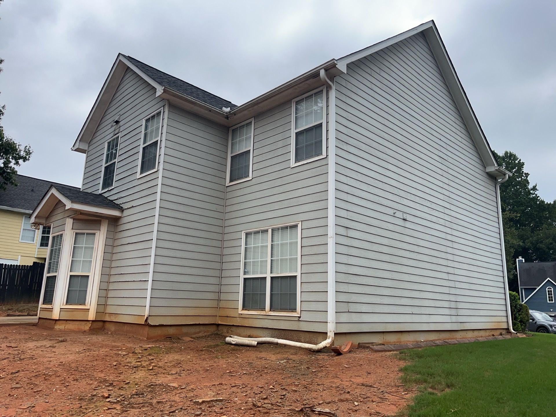 Lawrenceville, GA Full Siding Replacement, Exterior Painting, and Window Installation by Nelson Exteriors 