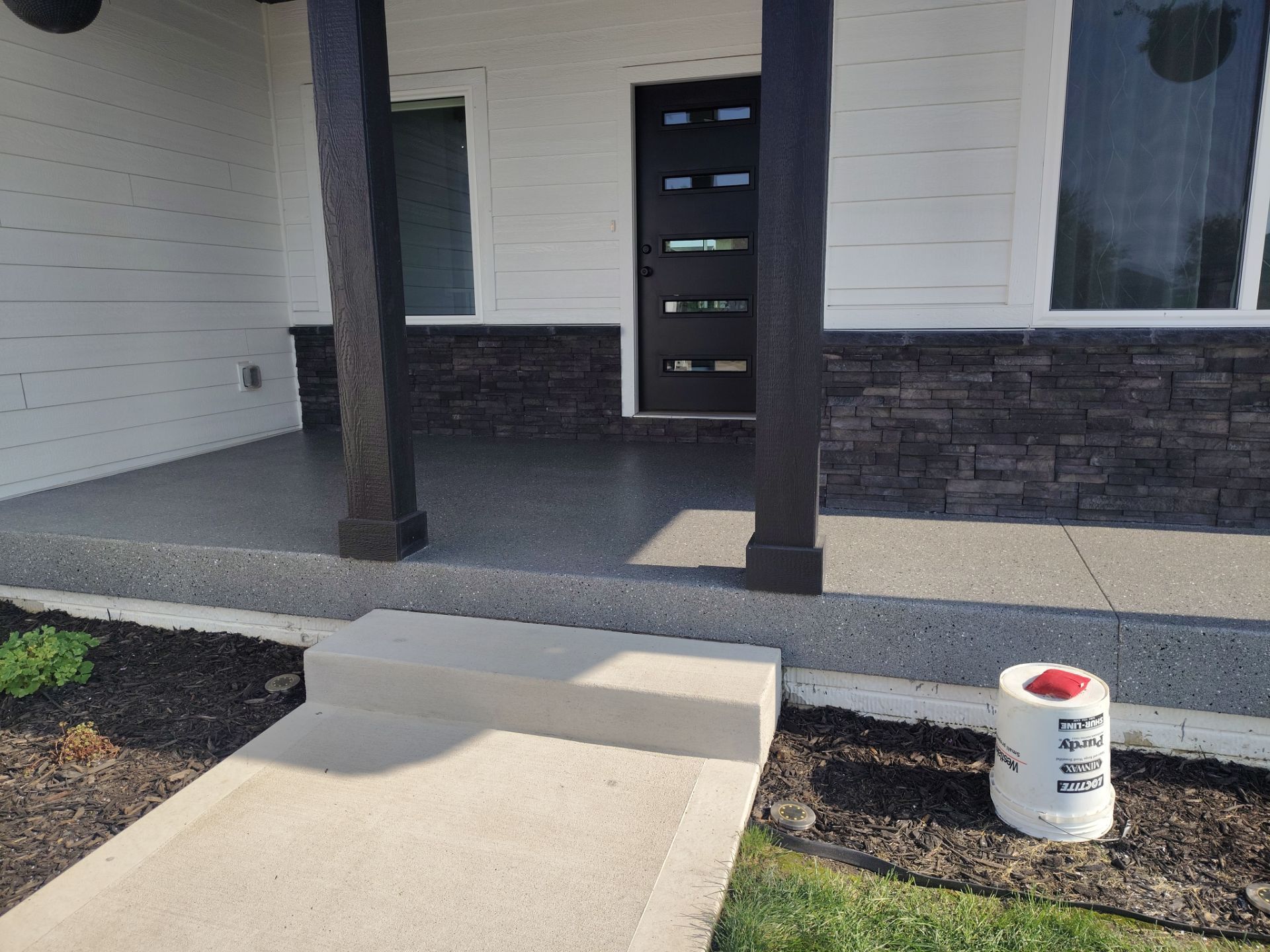 Textured Aggregate Concrete Porch Coating Installation in Norwalk by Revival Concrete Coatings