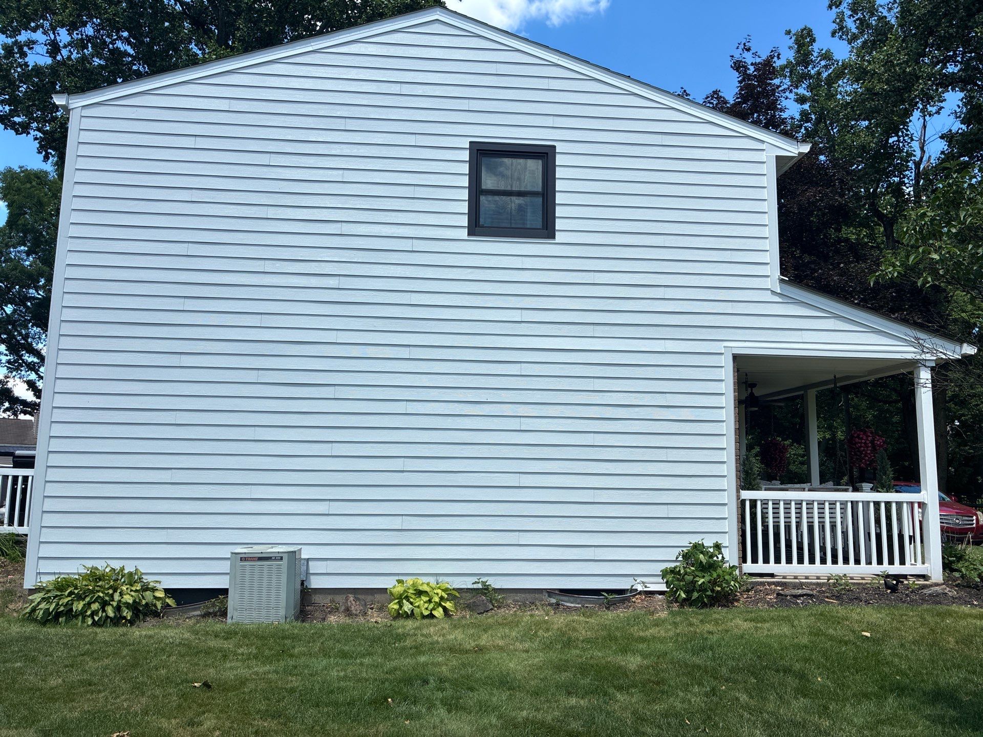 Vinyl Siding to James Hardie Arctic White with Midnight Black Trim by Ideal Siding Pittsburgh
