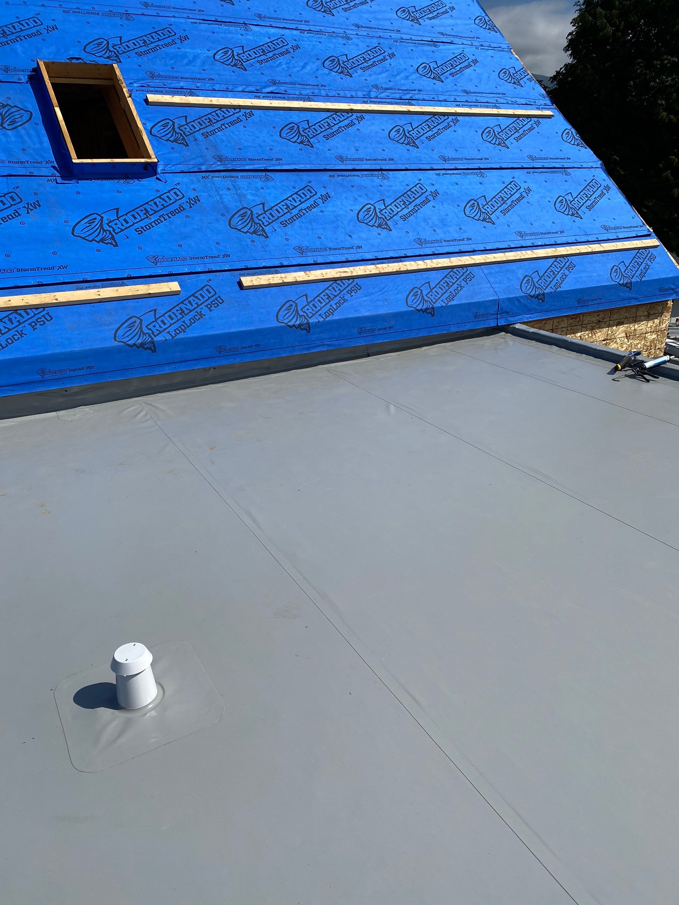 Residential Roofing Installation using multiple products by Top Notch Roofing Inc