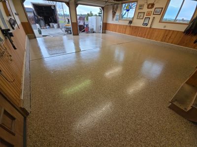 Sandstone Polyaspartic Garage Floor Coating Transformation in Davenport
