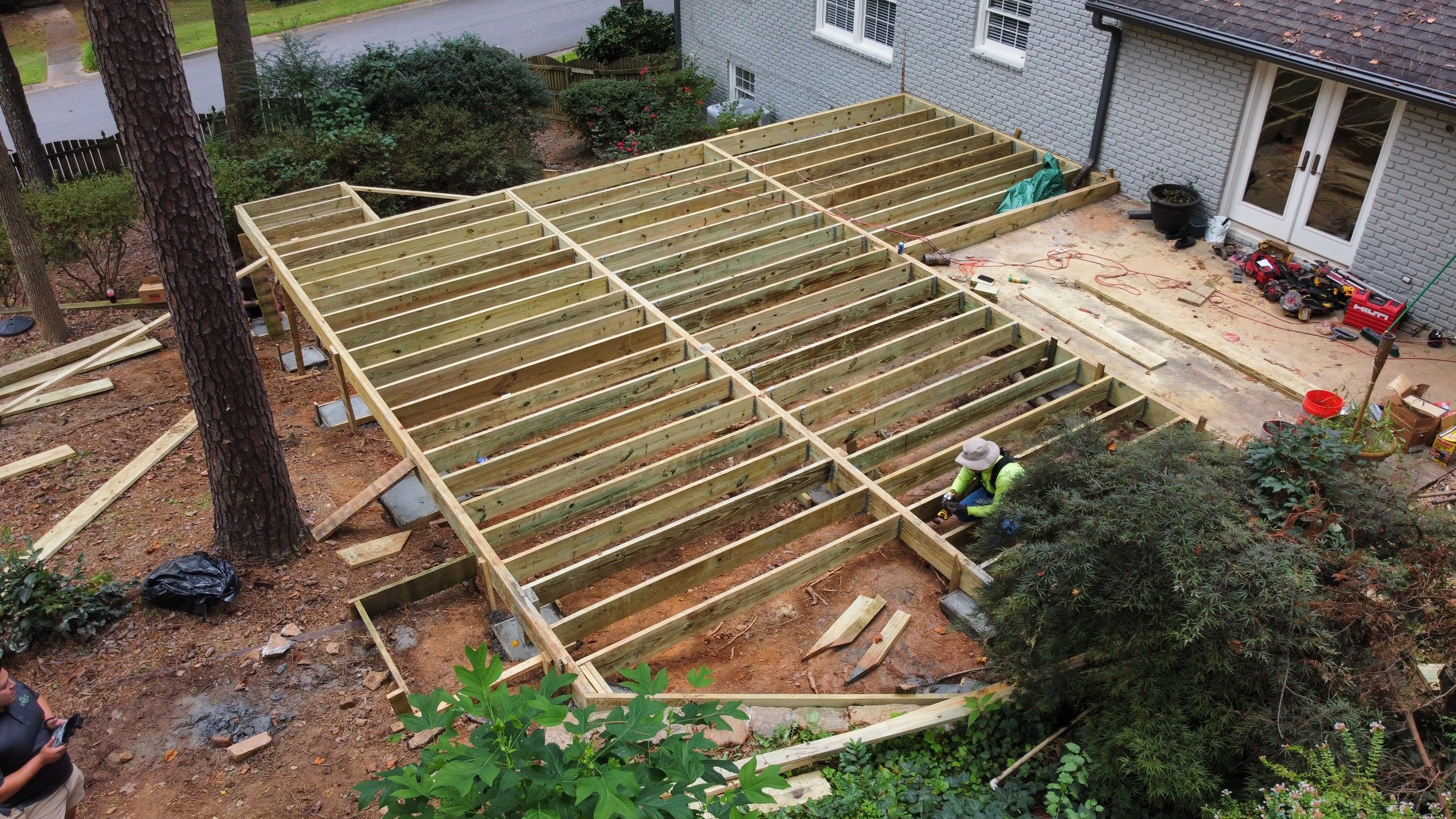 Custom Stained Wood Deck Installation with White Railings in Atlanta by Swift Home Renovations