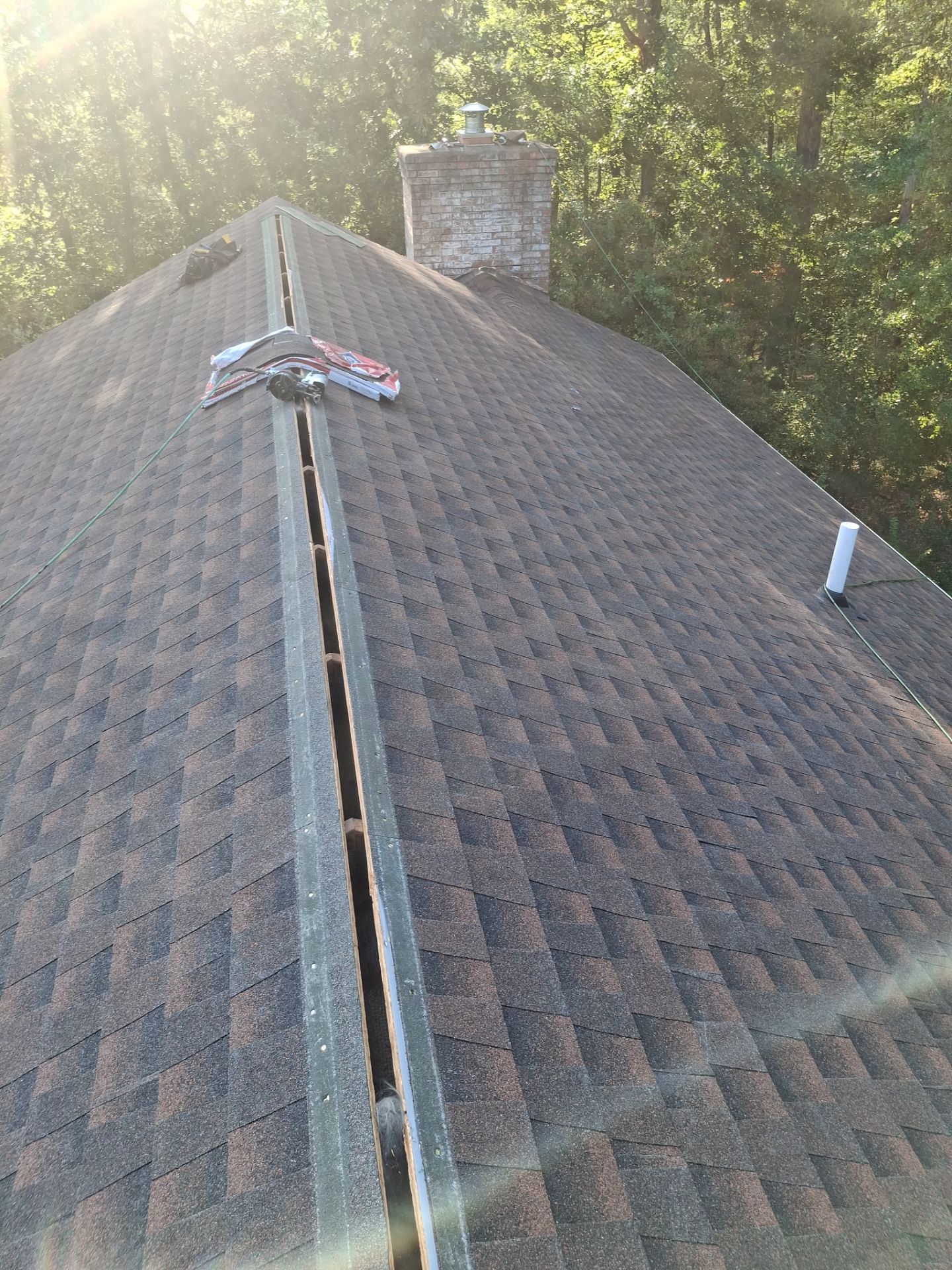 Residential Roofing Installation using GAF TImberline HDZ Hickory by Rainstoppers Roofing