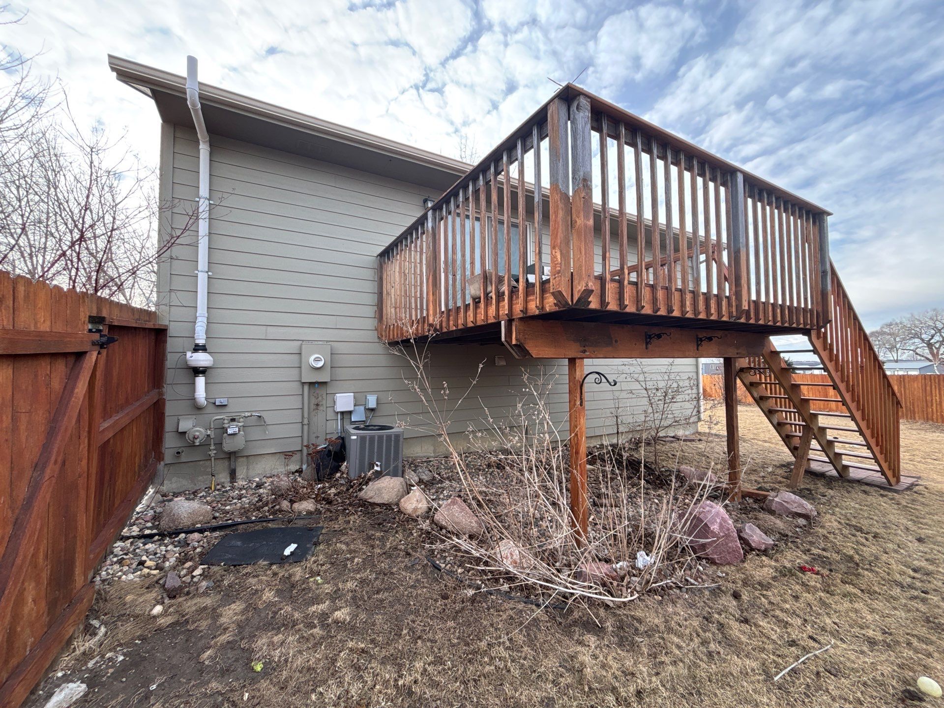 Full Exterior Residential Painting and Siding Refresh in Sioux Falls by Select Painting, Coatings & Garage Cabinets