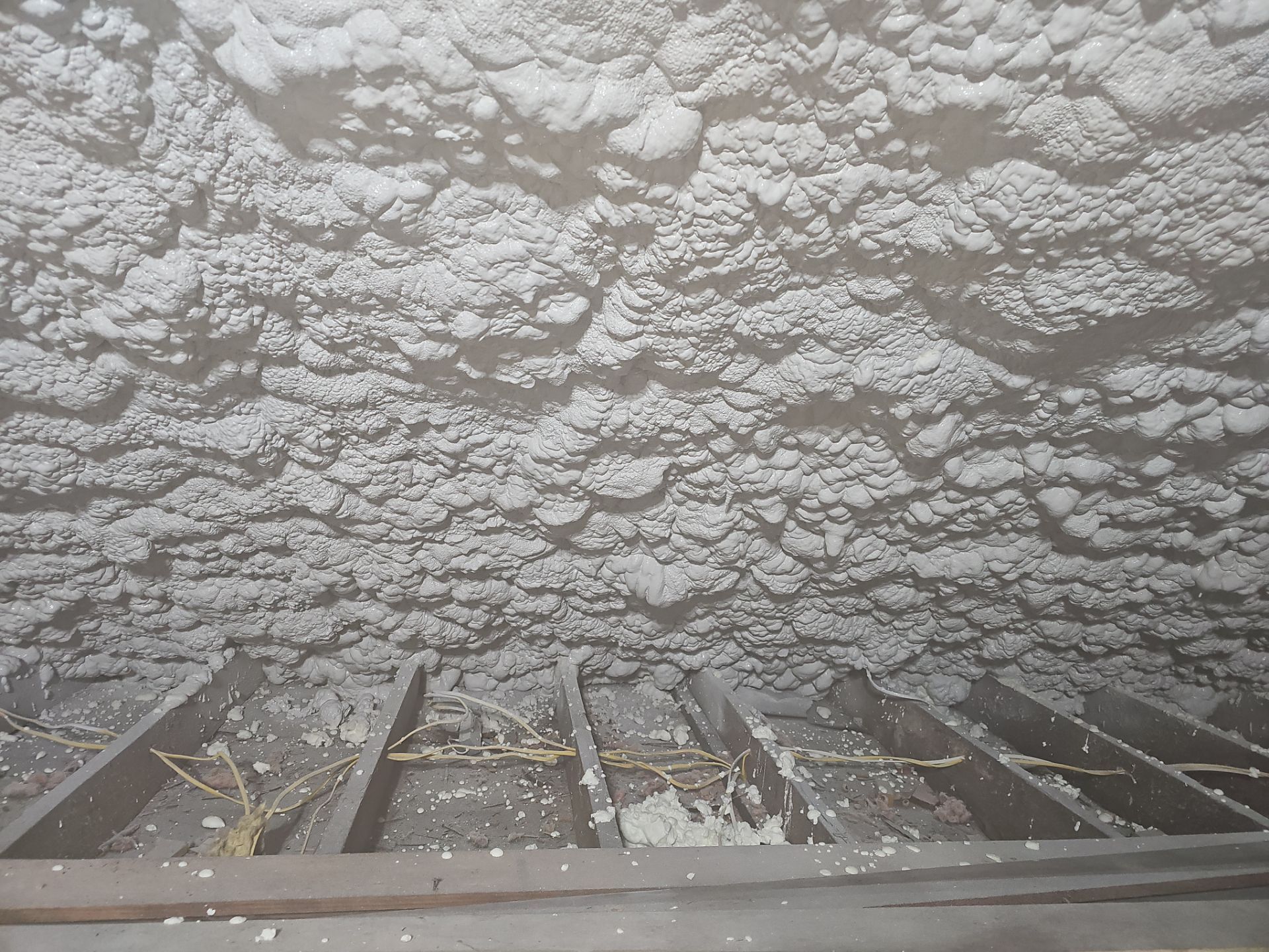Attic Insulation using open cell spray foam by NYS Foam & Energy