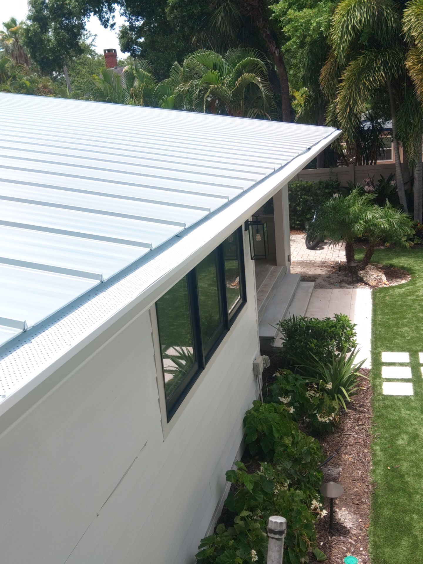 Aluminum Seamless Gutters using 3X4 Elbow Downspout in Sarasota FL by Gutter Professors