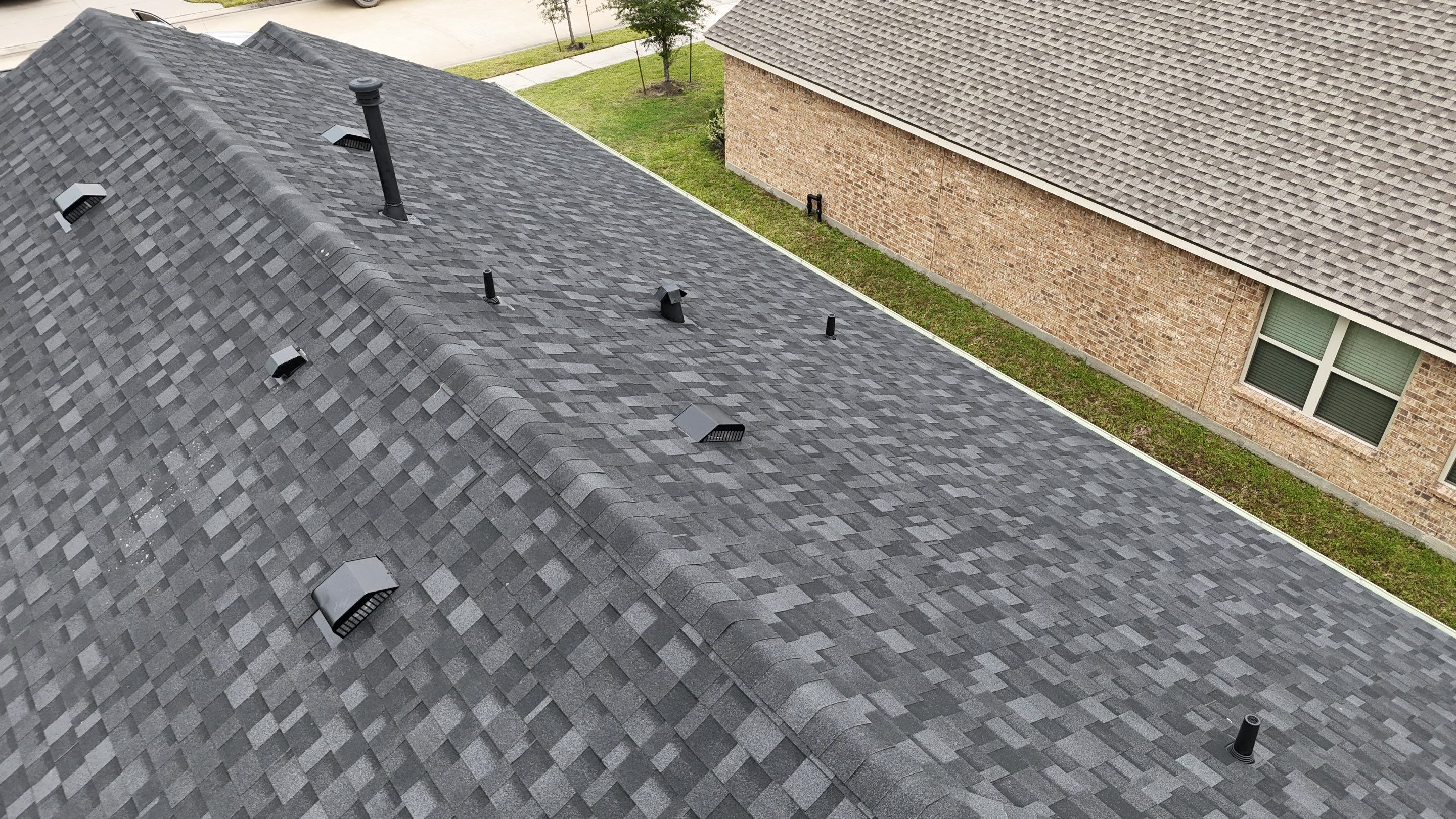 Roof Replacement completed after Insurance approval in Tomball by Core Four Roofing