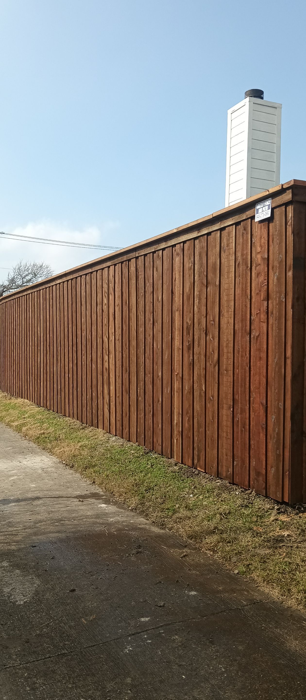 Pre-Stained 8' Board on Board cedar w/ trim and cap  by Grizzly Fence And Patio