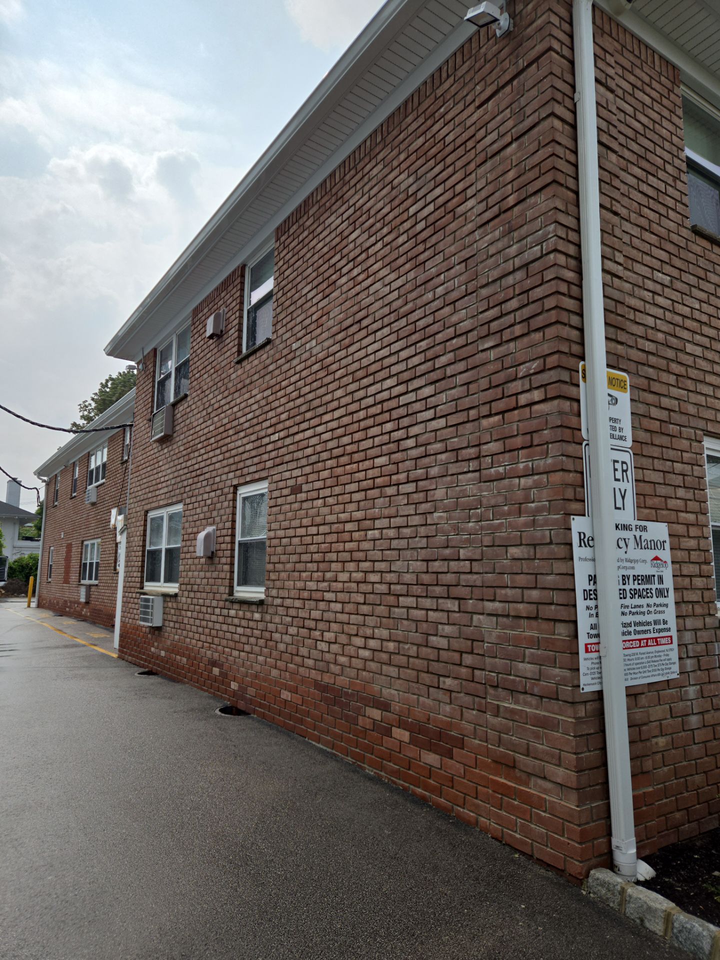 Multi-Unit Apartment Complex Exterior Brick Painting Project in Hackensack by Spectrum Painting, LLC