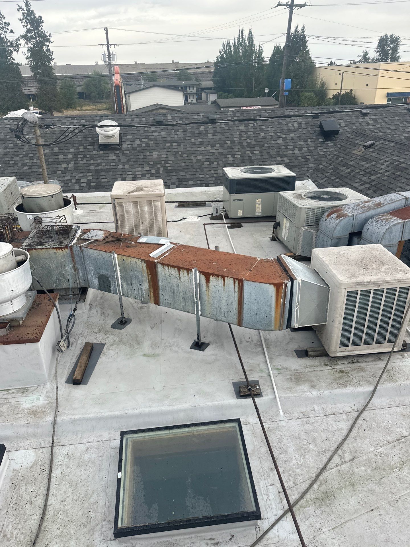 Summit Grey Lum Yun Salem Oregon Commercial Roof by Orezona Building & Roofing Company, Inc.