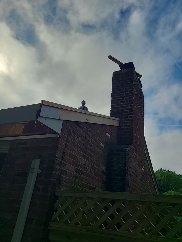 Springfield Tree Damage Restoration: CertainTeed Landmark Designer Shingles in Charcoal Black by RM Banning, Inc.
