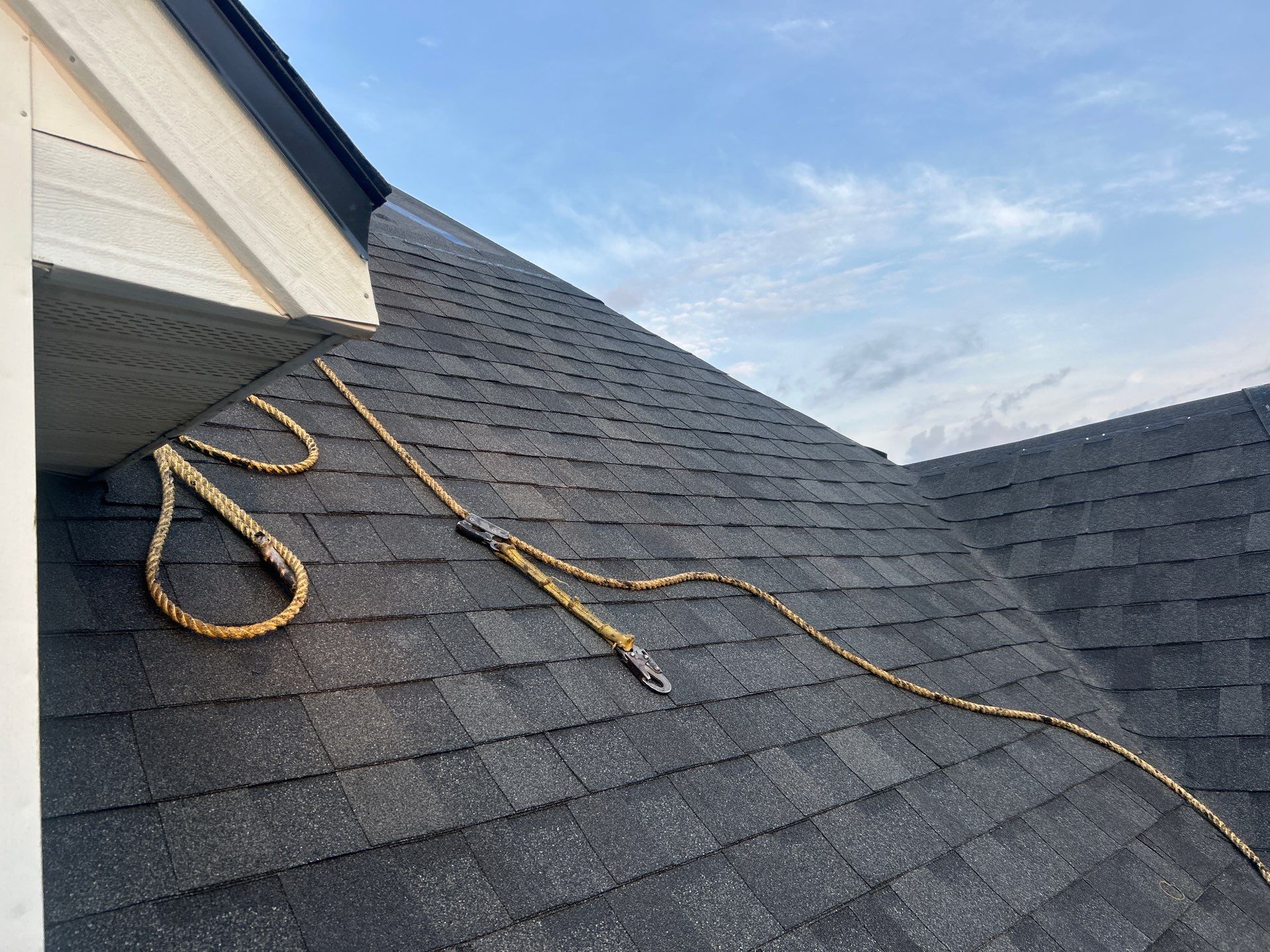 Residential Roofing Installation with Black Shadow Shingles in Clermont by Pinnacle Roofing Group