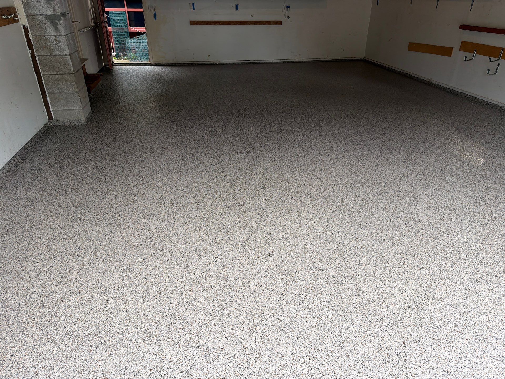 Vintage Goldmine Garage Coating by NG Masonry & Construction LLC