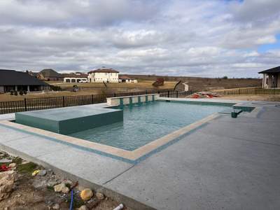 Geometric Pool with Raised Spa