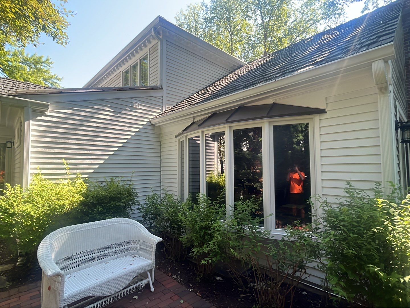 Housewashing  using Algaecide, soft wash soap by Northern Power Washing LLC.