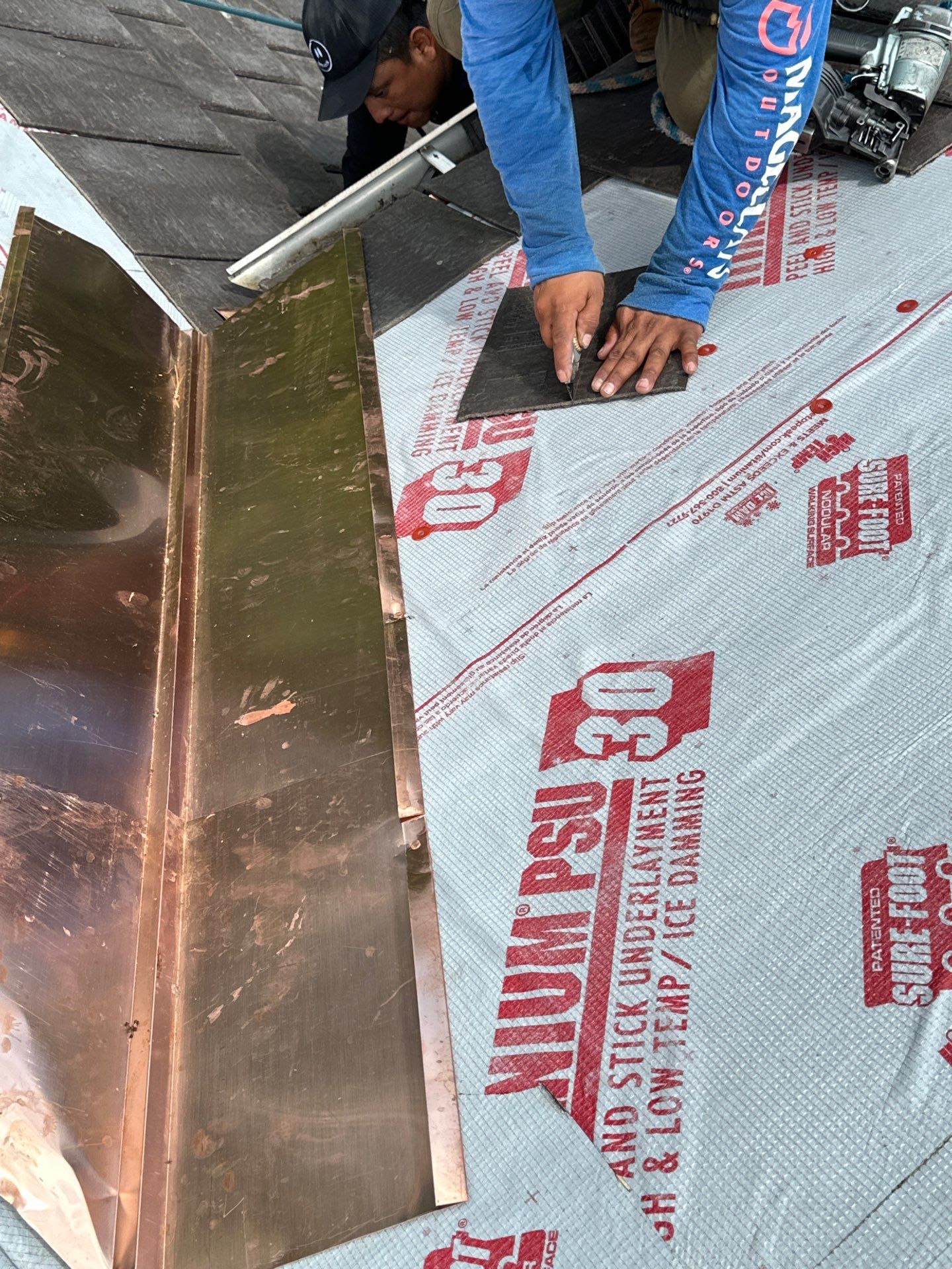 Residential Roofing Installation Using Enviroshake Synthetic Slate by Undersun Roofing 