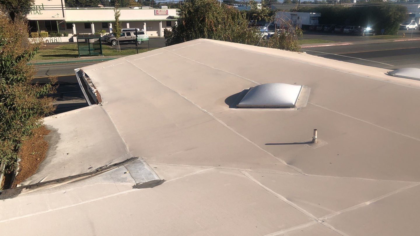 Spray foam and coatings using Conklin Benchmark/PUMA XL coatings and spray foam by Straight Edge Roofing Inc