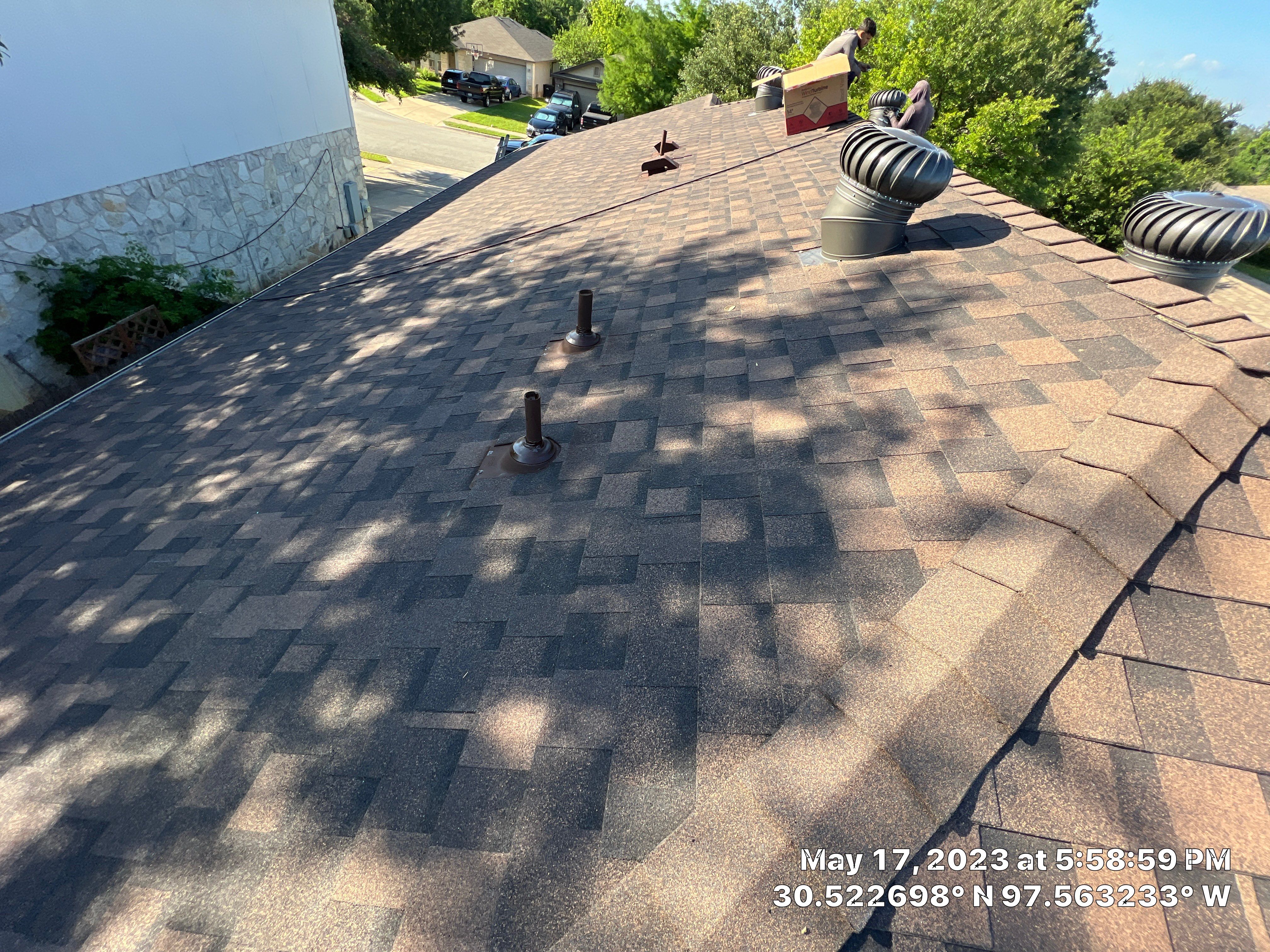 Residential Roof Replacement and Gutter System Upgrade in Hutto by Caliber Restoration LLC