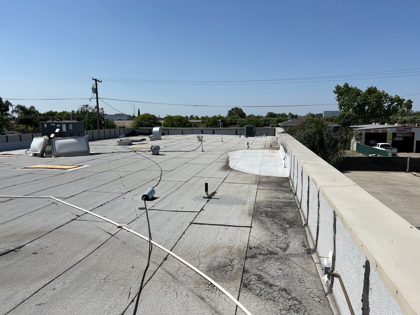 Spray foam and coatings using Conklin Benchmark/PUMA XL coatings and spray foam by Straight Edge Roofing Inc