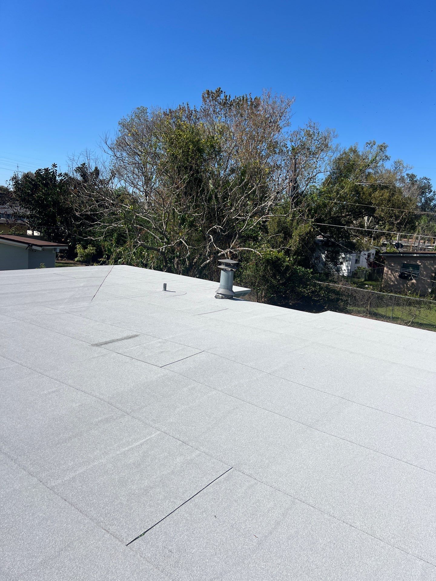 Flat Roof Replacement by Pinnacle Roofing Group