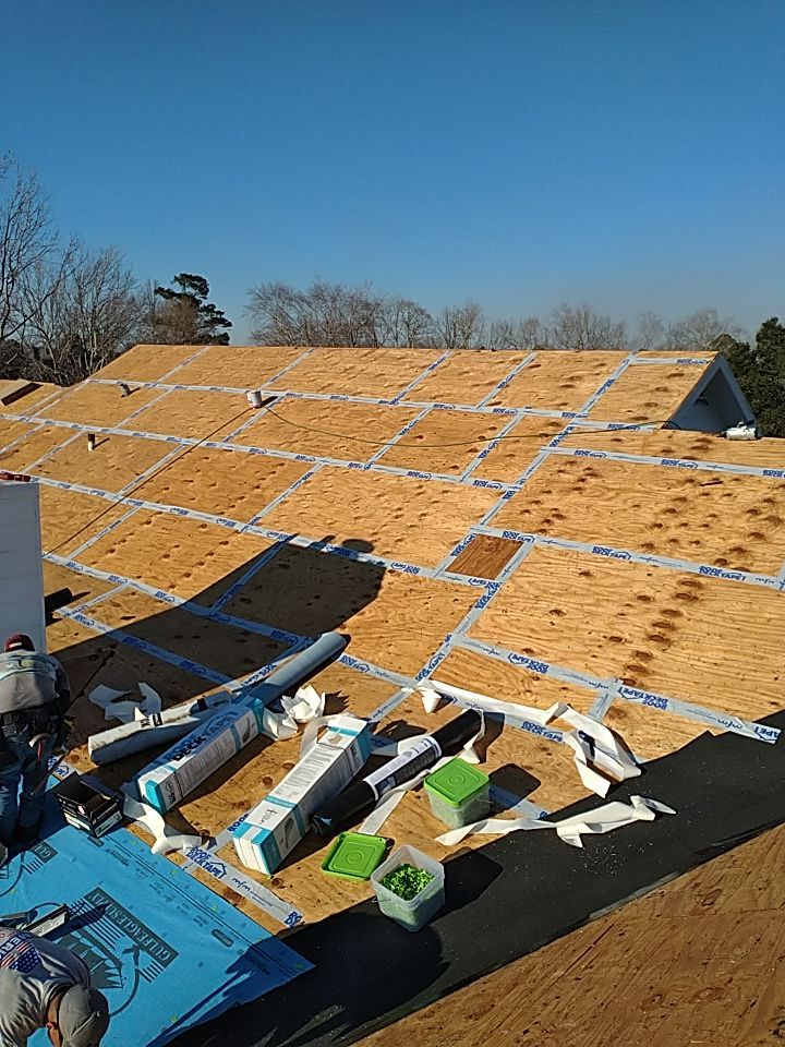 Residential Roofing Installation using Roof Replacement by American Roofing & Construction LLC